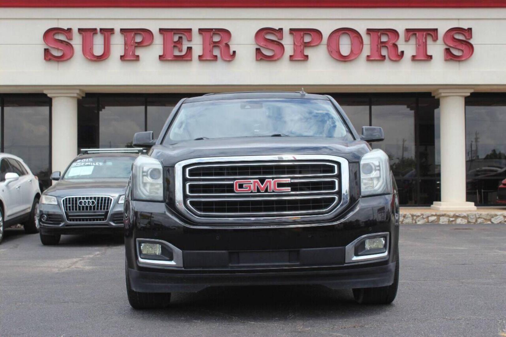 2015 Black GMC Yukon SLT 2WD (1GKS1BKCXFR) with an 5.3L V8 OHV 16V engine, 6-Speed Automatic transmission, located at 4301 NW 39th , Oklahoma City, OK, 73112, (405) 949-5600, 35.512135, -97.598671 - NO DRIVERS LICENCE NO-FULL COVERAGE INSURANCE-NO CREDIT CHECK. COME ON OVER TO SUPERSPORTS AND TAKE A LOOK AND TEST DRIVE. PLEASE GIVE US A CALL AT (405) 949-5600. NO LICENSIA DE MANEJAR- NO SEGURO DE COBERTURA TOTAL- NO VERIFICACCION DE CREDITO. POR FAVOR VENGAN A SUPERSPORTS, ECHE UN - Photo#2