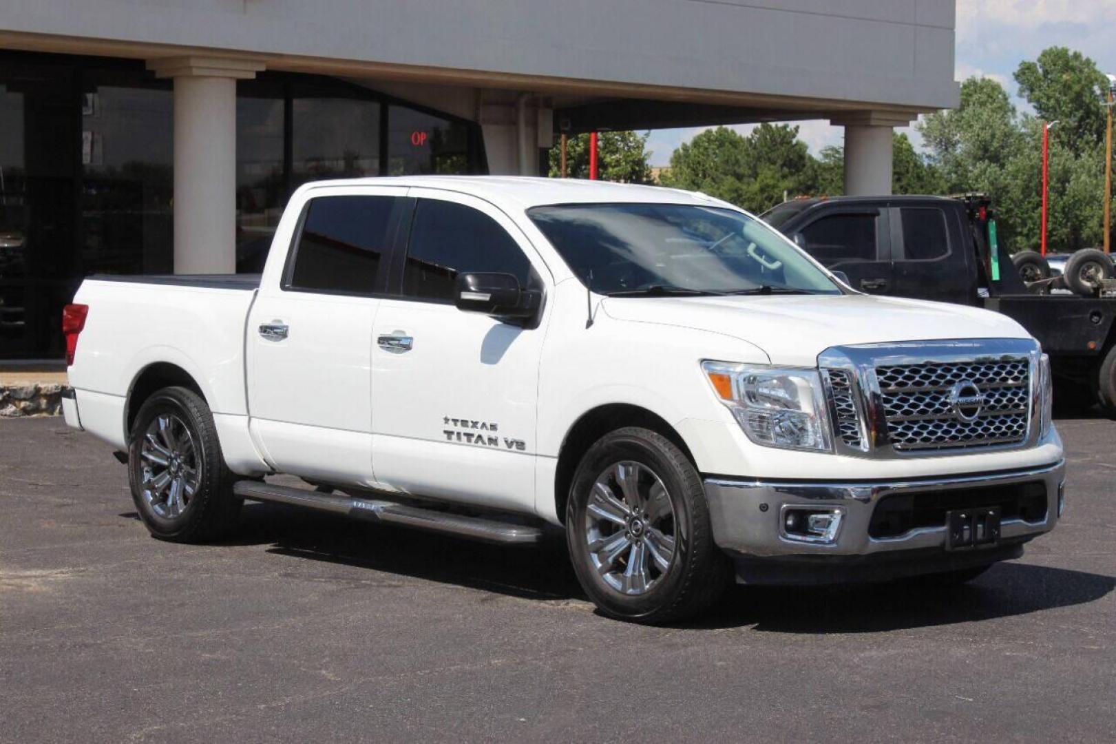 2018 White Nissan Titan Platinum Reserve Crew Cab 2WD (1N6AA1E68JN) with an 5.6L V8 DOHC 32V engine, 6A transmission, located at 4301 NW 39th , Oklahoma City, OK, 73112, (405) 949-5600, 35.512135, -97.598671 - NO DRIVERS LICENCE NO-FULL COVERAGE INSURANCE-NO CREDIT CHECK. COME ON OVER TO SUPERSPORTS AND TAKE A LOOK AND TEST DRIVE. PLEASE GIVE US A CALL AT (405) 949-5600. NO LICENSIA DE MANEJAR- NO SEGURO DE COBERTURA TOTAL- NO VERIFICACCION DE CREDITO. POR FAVOR VENGAN A SUPERSPORTS, ECHE UN - Photo#0