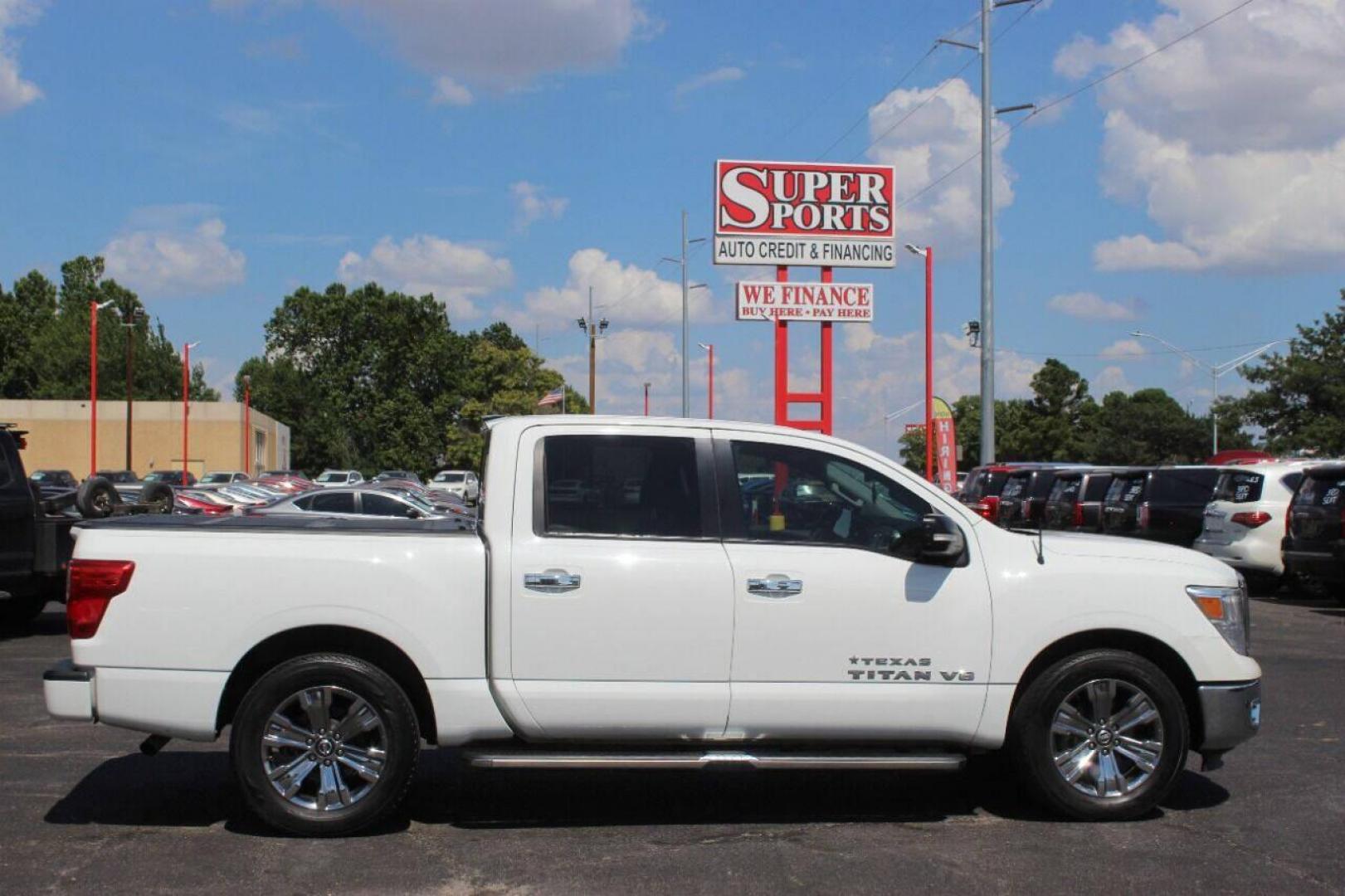 2018 White Nissan Titan Platinum Reserve Crew Cab 2WD (1N6AA1E68JN) with an 5.6L V8 DOHC 32V engine, 6A transmission, located at 4301 NW 39th , Oklahoma City, OK, 73112, (405) 949-5600, 35.512135, -97.598671 - NO DRIVERS LICENCE NO-FULL COVERAGE INSURANCE-NO CREDIT CHECK. COME ON OVER TO SUPERSPORTS AND TAKE A LOOK AND TEST DRIVE. PLEASE GIVE US A CALL AT (405) 949-5600. NO LICENSIA DE MANEJAR- NO SEGURO DE COBERTURA TOTAL- NO VERIFICACCION DE CREDITO. POR FAVOR VENGAN A SUPERSPORTS, ECHE UN - Photo#3