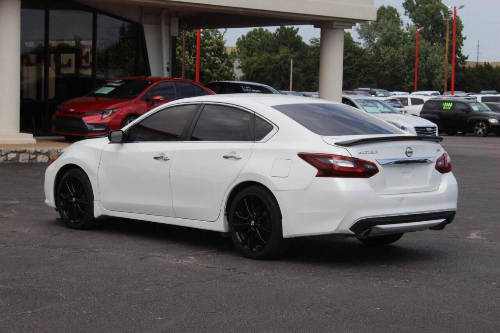 2017 White Nissan Altima 2.5 S (1N4AL3AP7HN) with an 2.5L L4 DOHC 16V engine, CVT transmission, located at 4301 NW 39th , Oklahoma City, OK, 73112, (405) 949-5600, 35.512135, -97.598671 - NO DRIVERS LICENCE NO-FULL COVERAGE INSURANCE-NO CREDIT CHECK. COME ON OVER TO SUPERSPORTS AND TAKE A LOOK AND TEST DRIVE. PLEASE GIVE US A CALL AT (405) 949-5600. NO LICENSIA DE MANEJAR- NO SEGURO DE COBERTURA TOTAL- NO VERIFICACCION DE CREDITO. POR FAVOR VENGAN A SUPERSPORTS, ECHE UN - Photo#5