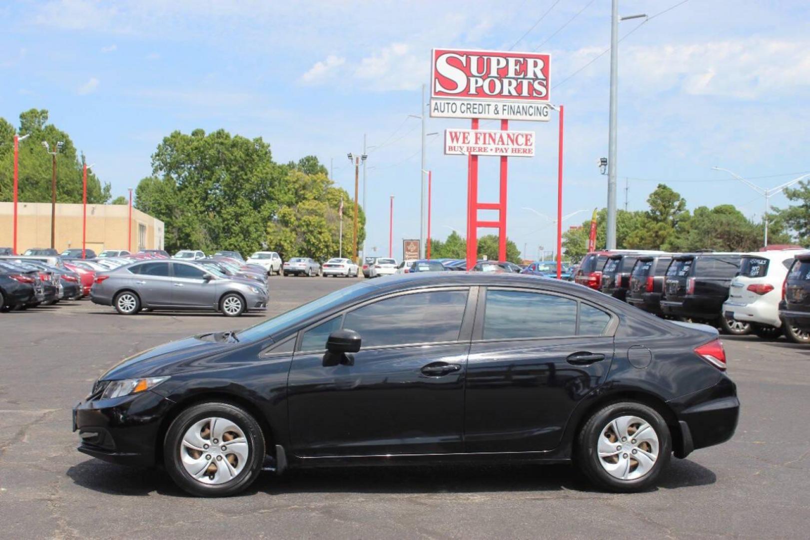 2014 Black Honda Civic LX Sedan CVT (19XFB2F57EE) with an 1.8L L4 SOHC 16V engine, Continuously Variable Transmission transmission, located at 4301 NW 39th , Oklahoma City, OK, 73112, (405) 949-5600, 35.512135, -97.598671 - NO DRIVERS LICENCE NO-FULL COVERAGE INSURANCE-NO CREDIT CHECK. COME ON OVER TO SUPERSPORTS AND TAKE A LOOK AND TEST DRIVE. PLEASE GIVE US A CALL AT (405) 949-5600. NO LICENSIA DE MANEJAR- NO SEGURO DE COBERTURA TOTAL- NO VERIFICACCION DE CREDITO. POR FAVOR VENGAN A SUPERSPORTS, ECHE UN - Photo#6