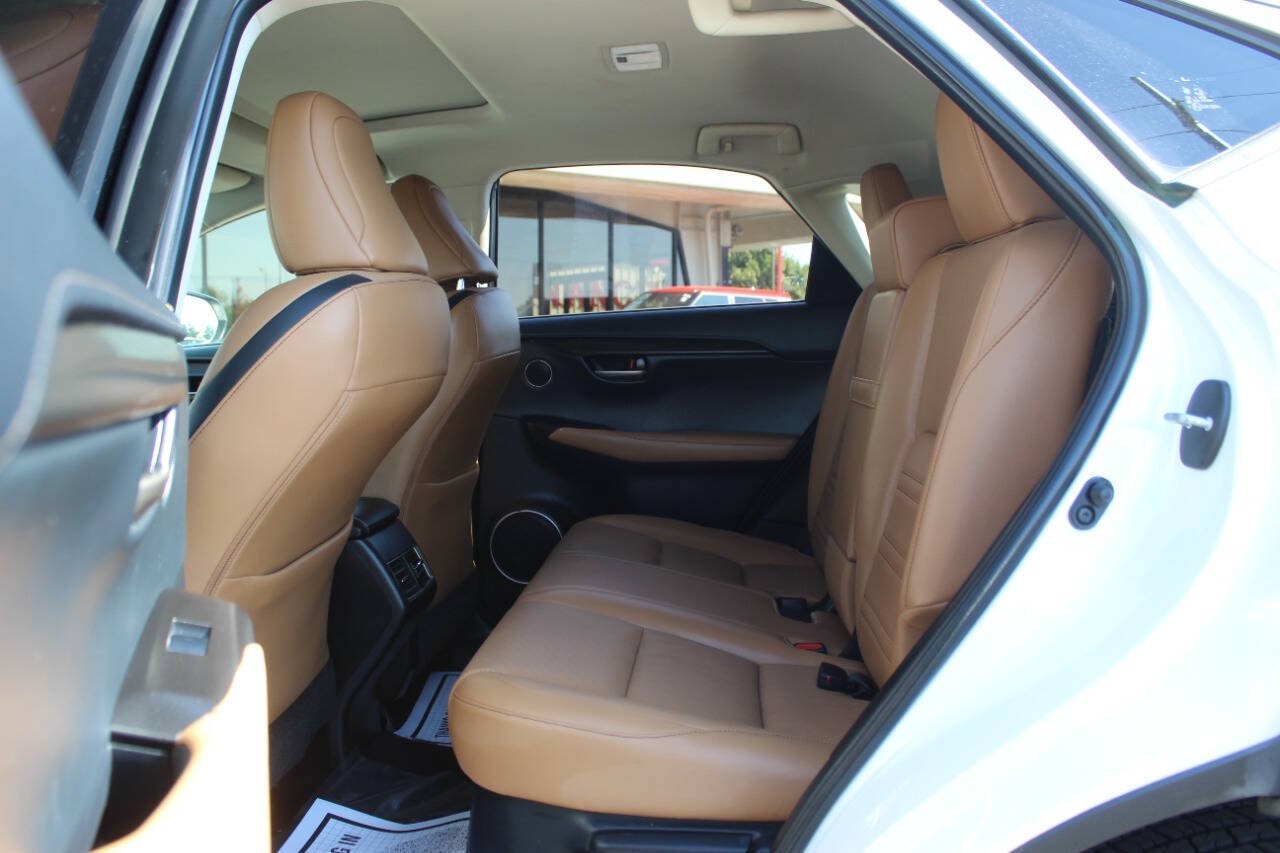 2015 White Lexus NX 200t FWD (JTJYARBZ9F2) with an 2.0L I4 Turbocharger 2.0L I4 engine, Automatic 6-Speed transmission, located at 4301 NW 39th , Oklahoma City, OK, 73112, (405) 949-5600, 35.512135, -97.598671 - Hablamos espanol. SPEND SMART --- BUY FROM SUPER SPORTS. ALL PRICES, DOWN PAYMENTS, PAYMENTS, AND FINANCE TERMS ARE NEGOTIABLE AT THE TIME OF APPROVAL. WE WILL WORK WITH YOU TO FIT YOUR BUDGET. WE WILL EVEN LOWER AND ADJUST THE NUMBERS TO HELP MAKE THE VEHICLE MORE AFFORDABLE FOR YOU.- Photo#16