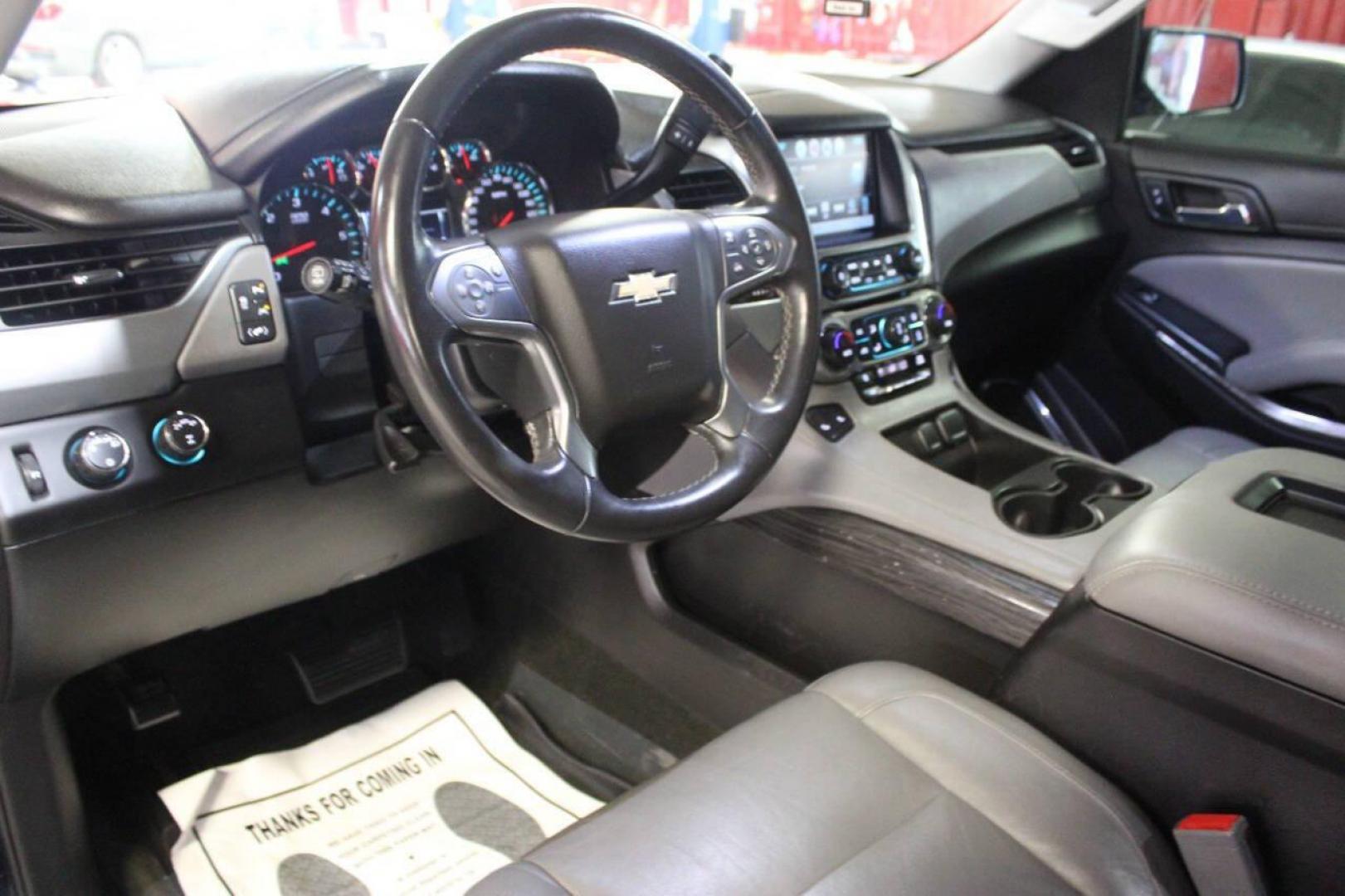 2017 Blue Chevrolet Tahoe LT 4WD (1GNSKBKC4HR) with an 5.3L V8 OHV 16V engine, 6A transmission, located at 4301 NW 39th , Oklahoma City, OK, 73112, (405) 949-5600, 35.512135, -97.598671 - NO DRIVERS LICENCE NO-FULL COVERAGE INSURANCE-NO CREDIT CHECK. COME ON OVER TO SUPERSPORTS AND TAKE A LOOK AND TEST DRIVE. PLEASE GIVE US A CALL AT (405) 949-5600. NO LICENSIA DE MANEJAR- NO SEGURO DE COBERTURA TOTAL- NO VERIFICACCION DE CREDITO. POR FAVOR VENGAN A SUPERSPORTS, ECHE UN - Photo#14