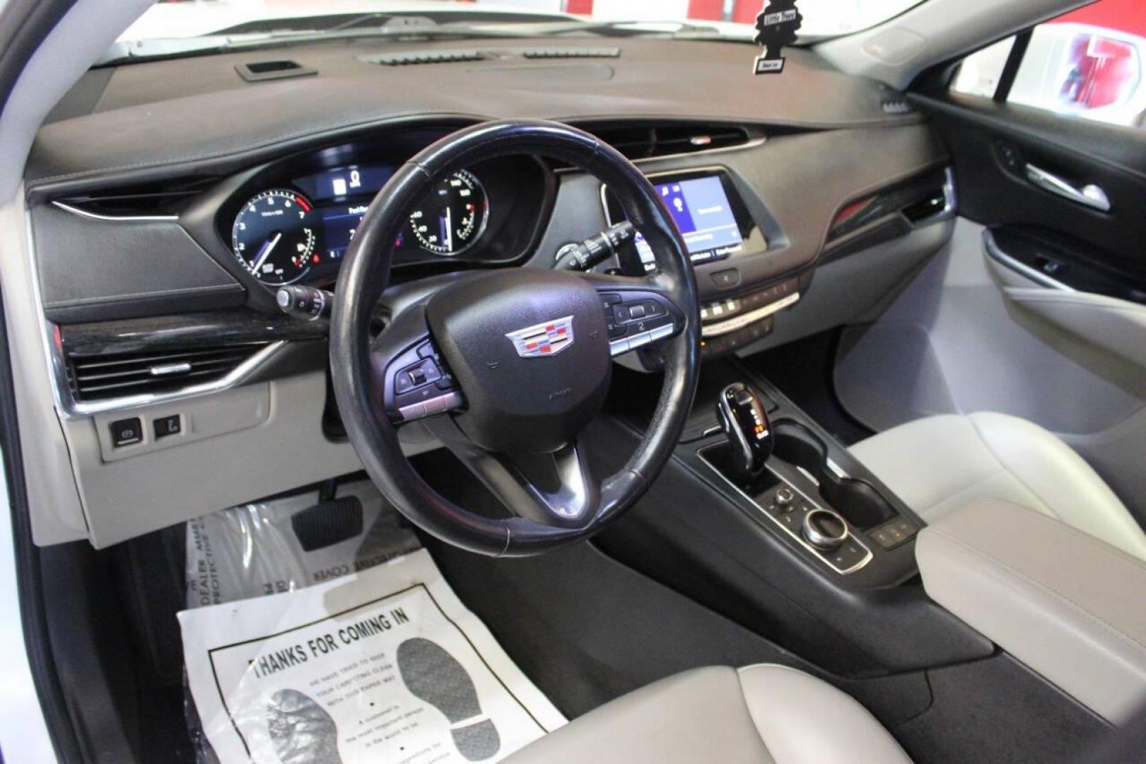 2021 White Cadillac XT4 Premium Luxury AWD (1GYFZDR46MF) with an 2.0L L4 DOHC 16V engine, 9A transmission, located at 4301 NW 39th , Oklahoma City, OK, 73112, (405) 949-5600, 35.512135, -97.598671 - NO DRIVERS LICENCE NO-FULL COVERAGE INSURANCE-NO CREDIT CHECK. COME ON OVER TO SUPERSPORTS AND TAKE A LOOK AND TEST DRIVE. PLEASE GIVE US A CALL AT (405) 949-5600. NO LICENSIA DE MANEJAR- NO SEGURO DE COBERTURA TOTAL- NO VERIFICACCION DE CREDITO. POR FAVOR VENGAN A SUPERSPORTS, ECHE UN - Photo#15