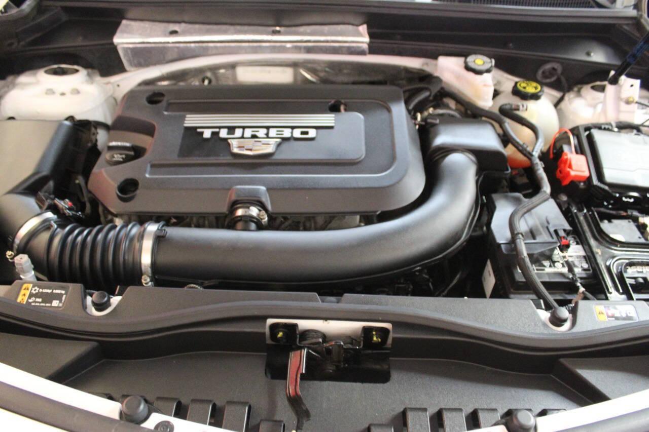 2021 White Cadillac XT4 Premium Luxury AWD (1GYFZDR46MF) with an 2.0L I4 Turbocharger 2.0L I4 engine, Automatic 9-Speed transmission, located at 4301 NW 39th , Oklahoma City, OK, 73112, (405) 949-5600, 35.512135, -97.598671 - NO DRIVERS LICENCE NO-FULL COVERAGE INSURANCE-NO CREDIT CHECK. COME ON OVER TO SUPERSPORTS AND TAKE A LOOK AND TEST DRIVE. PLEASE GIVE US A CALL AT (405) 949-5600. NO LICENSIA DE MANEJAR- NO SEGURO DE COBERTURA TOTAL- NO VERIFICACCION DE CREDITO. POR FAVOR VENGAN A SUPERSPORTS, ECHE UN - Photo#7