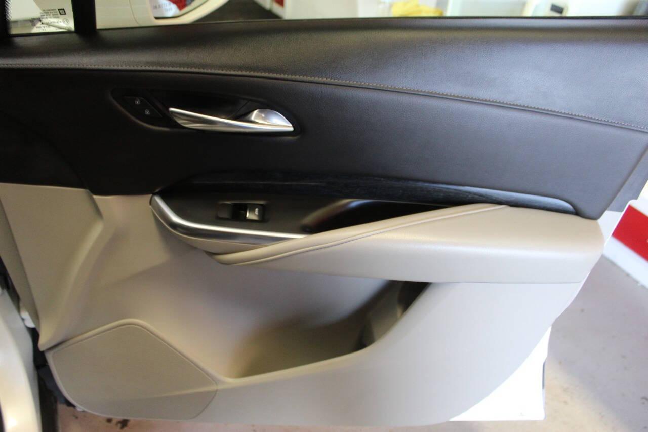 2021 White Cadillac XT4 Premium Luxury AWD (1GYFZDR46MF) with an 2.0L I4 Turbocharger 2.0L I4 engine, Automatic 9-Speed transmission, located at 4301 NW 39th , Oklahoma City, OK, 73112, (405) 949-5600, 35.512135, -97.598671 - NO DRIVERS LICENCE NO-FULL COVERAGE INSURANCE-NO CREDIT CHECK. COME ON OVER TO SUPERSPORTS AND TAKE A LOOK AND TEST DRIVE. PLEASE GIVE US A CALL AT (405) 949-5600. NO LICENSIA DE MANEJAR- NO SEGURO DE COBERTURA TOTAL- NO VERIFICACCION DE CREDITO. POR FAVOR VENGAN A SUPERSPORTS, ECHE UN - Photo#9