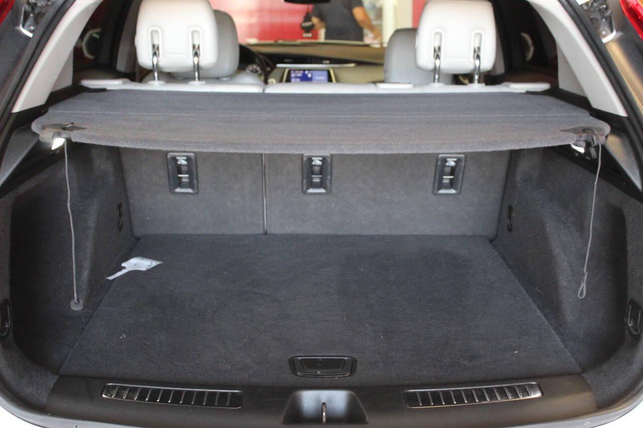 2021 White Cadillac XT4 Premium Luxury AWD (1GYFZDR46MF) with an 2.0L I4 Turbocharger 2.0L I4 engine, Automatic 9-Speed transmission, located at 4301 NW 39th , Oklahoma City, OK, 73112, (405) 949-5600, 35.512135, -97.598671 - NO DRIVERS LICENCE NO-FULL COVERAGE INSURANCE-NO CREDIT CHECK. COME ON OVER TO SUPERSPORTS AND TAKE A LOOK AND TEST DRIVE. PLEASE GIVE US A CALL AT (405) 949-5600. NO LICENSIA DE MANEJAR- NO SEGURO DE COBERTURA TOTAL- NO VERIFICACCION DE CREDITO. POR FAVOR VENGAN A SUPERSPORTS, ECHE UN - Photo#12