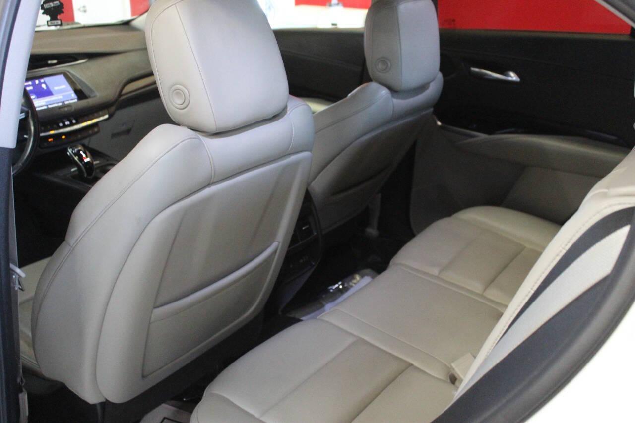 2021 White Cadillac XT4 Premium Luxury AWD (1GYFZDR46MF) with an 2.0L I4 Turbocharger 2.0L I4 engine, Automatic 9-Speed transmission, located at 4301 NW 39th , Oklahoma City, OK, 73112, (405) 949-5600, 35.512135, -97.598671 - NO DRIVERS LICENCE NO-FULL COVERAGE INSURANCE-NO CREDIT CHECK. COME ON OVER TO SUPERSPORTS AND TAKE A LOOK AND TEST DRIVE. PLEASE GIVE US A CALL AT (405) 949-5600. NO LICENSIA DE MANEJAR- NO SEGURO DE COBERTURA TOTAL- NO VERIFICACCION DE CREDITO. POR FAVOR VENGAN A SUPERSPORTS, ECHE UN - Photo#13