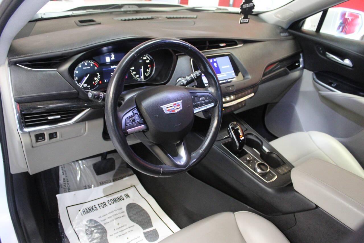 2021 White Cadillac XT4 Premium Luxury AWD (1GYFZDR46MF) with an 2.0L I4 Turbocharger 2.0L I4 engine, Automatic 9-Speed transmission, located at 4301 NW 39th , Oklahoma City, OK, 73112, (405) 949-5600, 35.512135, -97.598671 - NO DRIVERS LICENCE NO-FULL COVERAGE INSURANCE-NO CREDIT CHECK. COME ON OVER TO SUPERSPORTS AND TAKE A LOOK AND TEST DRIVE. PLEASE GIVE US A CALL AT (405) 949-5600. NO LICENSIA DE MANEJAR- NO SEGURO DE COBERTURA TOTAL- NO VERIFICACCION DE CREDITO. POR FAVOR VENGAN A SUPERSPORTS, ECHE UN - Photo#15