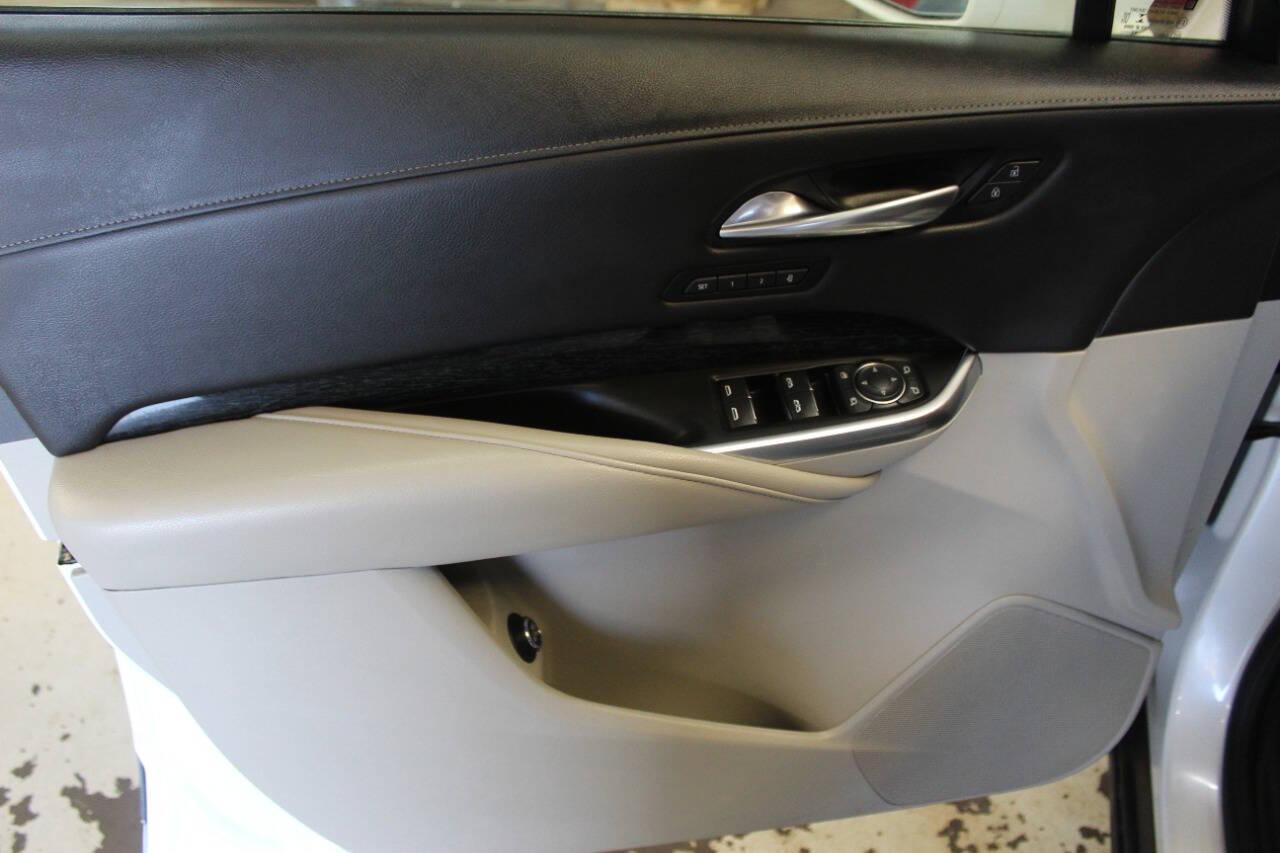 2021 White Cadillac XT4 Premium Luxury AWD (1GYFZDR46MF) with an 2.0L I4 Turbocharger 2.0L I4 engine, Automatic 9-Speed transmission, located at 4301 NW 39th , Oklahoma City, OK, 73112, (405) 949-5600, 35.512135, -97.598671 - NO DRIVERS LICENCE NO-FULL COVERAGE INSURANCE-NO CREDIT CHECK. COME ON OVER TO SUPERSPORTS AND TAKE A LOOK AND TEST DRIVE. PLEASE GIVE US A CALL AT (405) 949-5600. NO LICENSIA DE MANEJAR- NO SEGURO DE COBERTURA TOTAL- NO VERIFICACCION DE CREDITO. POR FAVOR VENGAN A SUPERSPORTS, ECHE UN - Photo#16