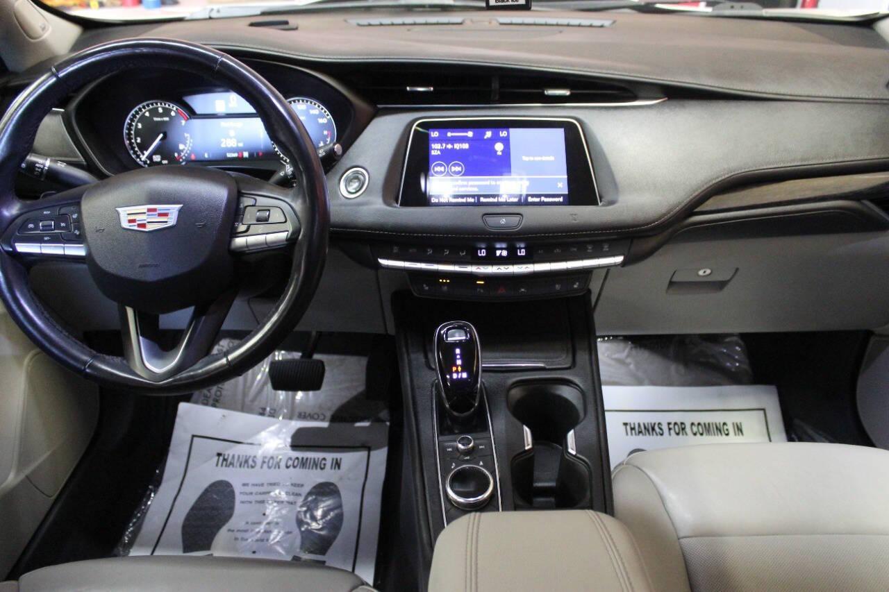 2021 White Cadillac XT4 Premium Luxury AWD (1GYFZDR46MF) with an 2.0L I4 Turbocharger 2.0L I4 engine, Automatic 9-Speed transmission, located at 4301 NW 39th , Oklahoma City, OK, 73112, (405) 949-5600, 35.512135, -97.598671 - NO DRIVERS LICENCE NO-FULL COVERAGE INSURANCE-NO CREDIT CHECK. COME ON OVER TO SUPERSPORTS AND TAKE A LOOK AND TEST DRIVE. PLEASE GIVE US A CALL AT (405) 949-5600. NO LICENSIA DE MANEJAR- NO SEGURO DE COBERTURA TOTAL- NO VERIFICACCION DE CREDITO. POR FAVOR VENGAN A SUPERSPORTS, ECHE UN - Photo#17