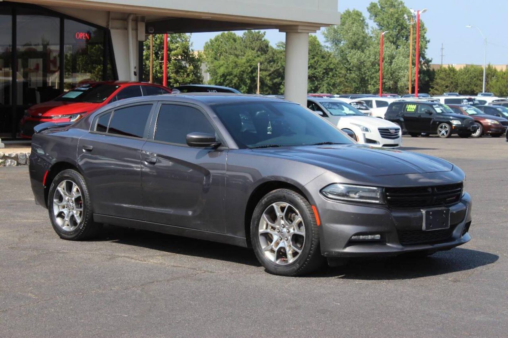 2016 Gray Dodge Charger SXT AWD (2C3CDXJG4GH) with an 3.6L V6 DOHC 24V engine, 8A transmission, located at 4301 NW 39th , Oklahoma City, OK, 73112, (405) 949-5600, 35.512135, -97.598671 - Photo#2