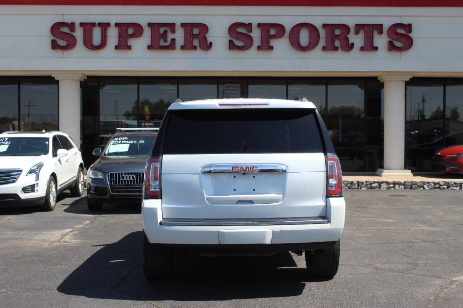 2016 White GMC Yukon Denali 4WD (1GKS2CKJ8GR) with an 6.2L V8 OHV 16V engine, 6A transmission, located at 4301 NW 39th , Oklahoma City, OK, 73112, (405) 949-5600, 35.512135, -97.598671 - NO DRIVERS LICENCE NO-FULL COVERAGE INSURANCE-NO CREDIT CHECK. COME ON OVER TO SUPERSPORTS AND TAKE A LOOK AND TEST DRIVE. PLEASE GIVE US A CALL AT (405) 949-5600. NO LICENSIA DE MANEJAR- NO SEGURO DE COBERTURA TOTAL- NO VERIFICACCION DE CREDITO. POR FAVOR VENGAN A SUPERSPORTS, ECHE UN - Photo#5
