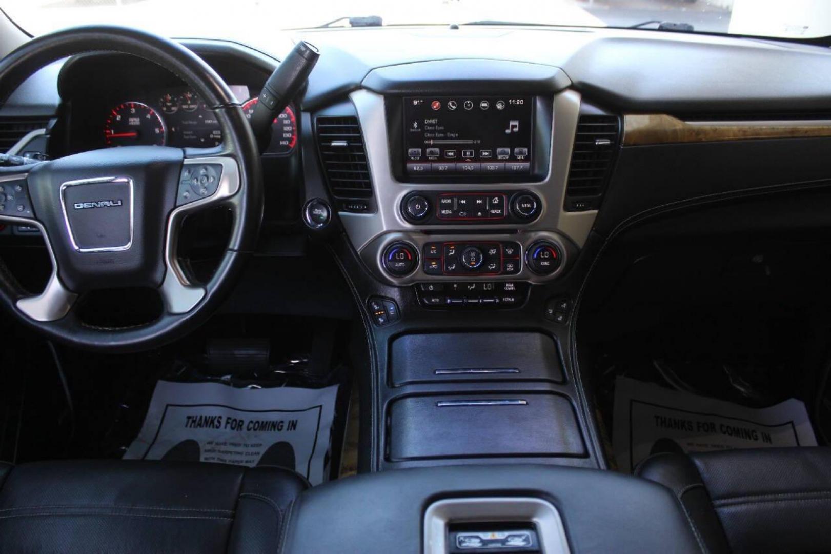 2016 White GMC Yukon Denali 4WD (1GKS2CKJ8GR) with an 6.2L V8 OHV 16V engine, 6A transmission, located at 4301 NW 39th , Oklahoma City, OK, 73112, (405) 949-5600, 35.512135, -97.598671 - NO DRIVERS LICENCE NO-FULL COVERAGE INSURANCE-NO CREDIT CHECK. COME ON OVER TO SUPERSPORTS AND TAKE A LOOK AND TEST DRIVE. PLEASE GIVE US A CALL AT (405) 949-5600. NO LICENSIA DE MANEJAR- NO SEGURO DE COBERTURA TOTAL- NO VERIFICACCION DE CREDITO. POR FAVOR VENGAN A SUPERSPORTS, ECHE UN - Photo#20
