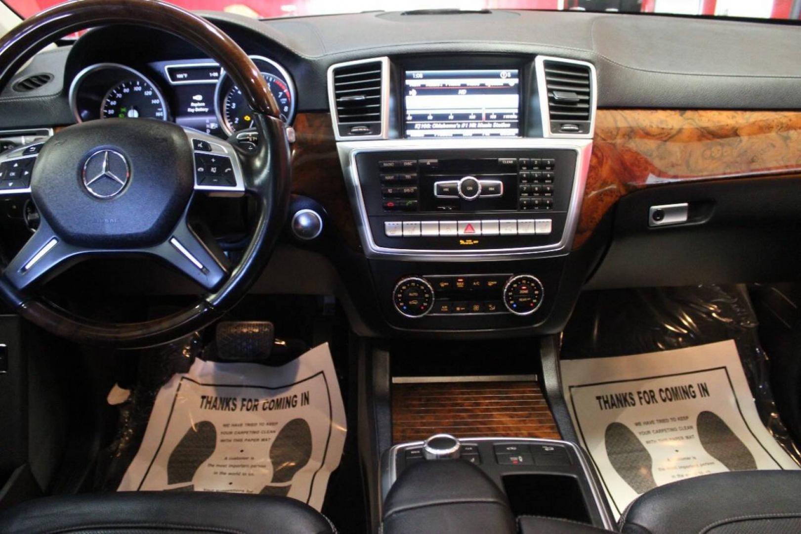 2015 Gray Mercedes-Benz GL-Class GL550 4MATIC (4JGDF7DE4FA) with an 4.7L V8 DOHC 32V engine, 7-Speed Automatic transmission, located at 4301 NW 39th , Oklahoma City, OK, 73112, (405) 949-5600, 35.512135, -97.598671 - Photo#19