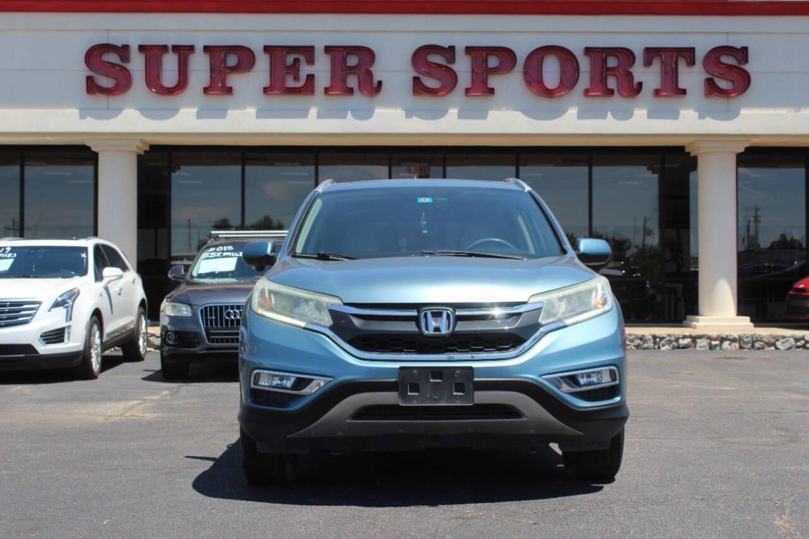 2016 Teal Honda CR-V EX-L AWD (2HKRM4H75GH) with an 2.4L L4 DOHC 16V engine, CVT transmission, located at 4301 NW 39th , Oklahoma City, OK, 73112, (405) 949-5600, 35.512135, -97.598671 - NO DRIVERS LICENCE NO-FULL COVERAGE INSURANCE-NO CREDIT CHECK. COME ON OVER TO SUPERSPORTS AND TAKE A LOOK AND TEST DRIVE. PLEASE GIVE US A CALL AT (405) 949-5600. NO LICENSIA DE MANEJAR- NO SEGURO DE COBERTURA TOTAL- NO VERIFICACCION DE CREDITO. POR FAVOR VENGAN A SUPERSPORTS, ECHE UN - Photo#3