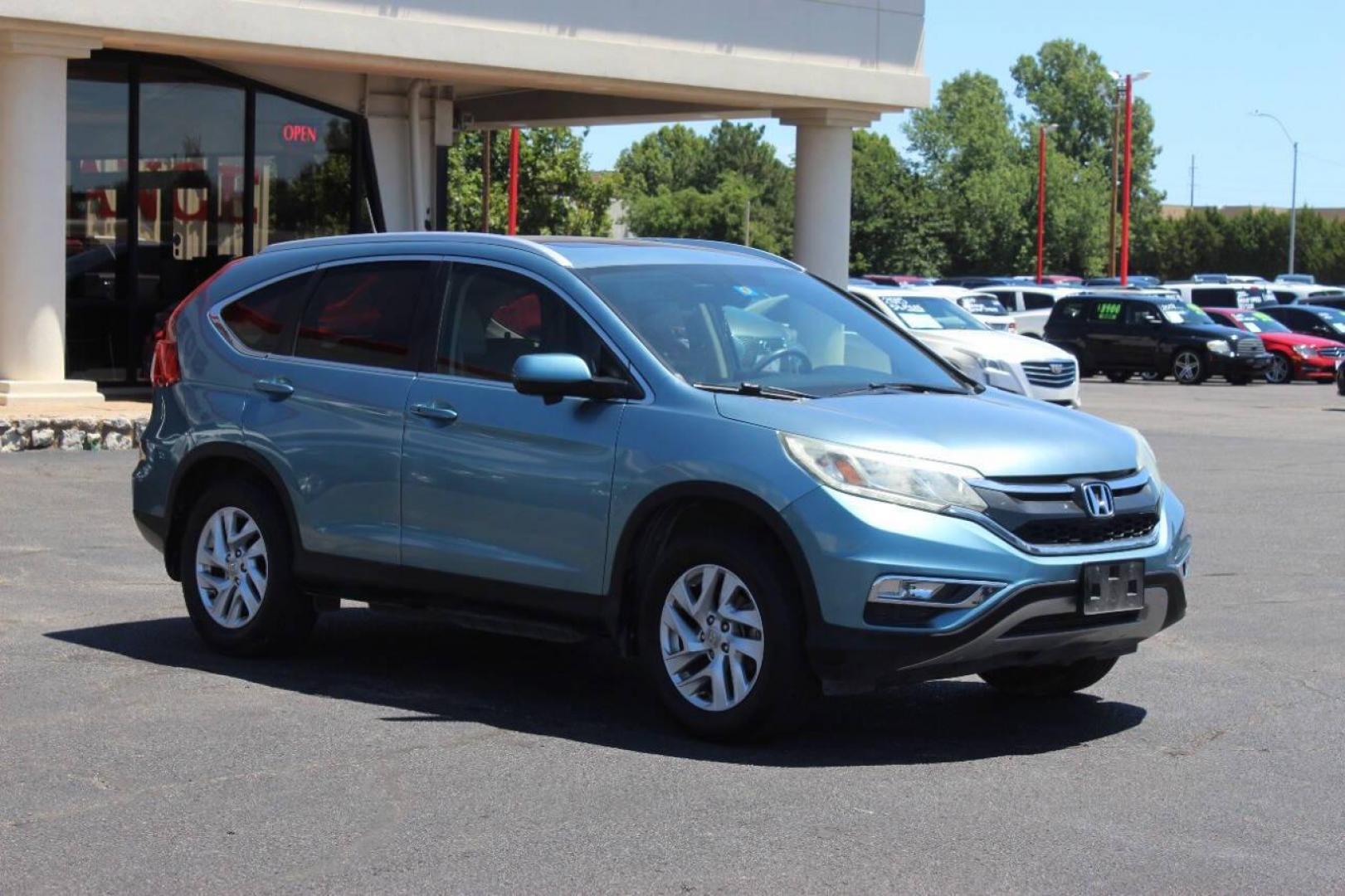 2016 Teal Honda CR-V EX-L AWD (2HKRM4H75GH) with an 2.4L L4 DOHC 16V engine, CVT transmission, located at 4301 NW 39th , Oklahoma City, OK, 73112, (405) 949-5600, 35.512135, -97.598671 - NO DRIVERS LICENCE NO-FULL COVERAGE INSURANCE-NO CREDIT CHECK. COME ON OVER TO SUPERSPORTS AND TAKE A LOOK AND TEST DRIVE. PLEASE GIVE US A CALL AT (405) 949-5600. NO LICENSIA DE MANEJAR- NO SEGURO DE COBERTURA TOTAL- NO VERIFICACCION DE CREDITO. POR FAVOR VENGAN A SUPERSPORTS, ECHE UN - Photo#2