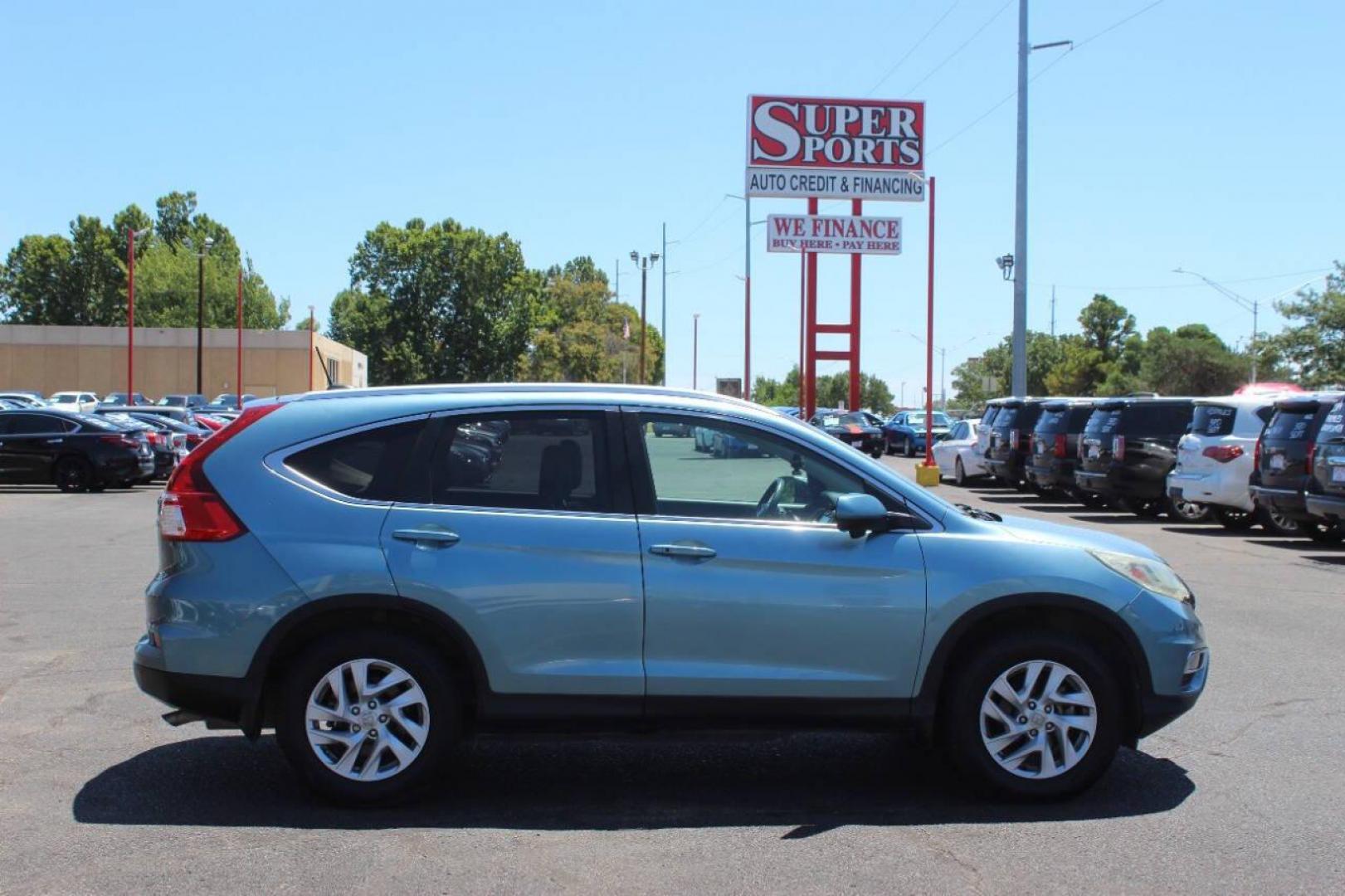 2016 Teal Honda CR-V EX-L AWD (2HKRM4H75GH) with an 2.4L L4 DOHC 16V engine, CVT transmission, located at 4301 NW 39th , Oklahoma City, OK, 73112, (405) 949-5600, 35.512135, -97.598671 - NO DRIVERS LICENCE NO-FULL COVERAGE INSURANCE-NO CREDIT CHECK. COME ON OVER TO SUPERSPORTS AND TAKE A LOOK AND TEST DRIVE. PLEASE GIVE US A CALL AT (405) 949-5600. NO LICENSIA DE MANEJAR- NO SEGURO DE COBERTURA TOTAL- NO VERIFICACCION DE CREDITO. POR FAVOR VENGAN A SUPERSPORTS, ECHE UN - Photo#4