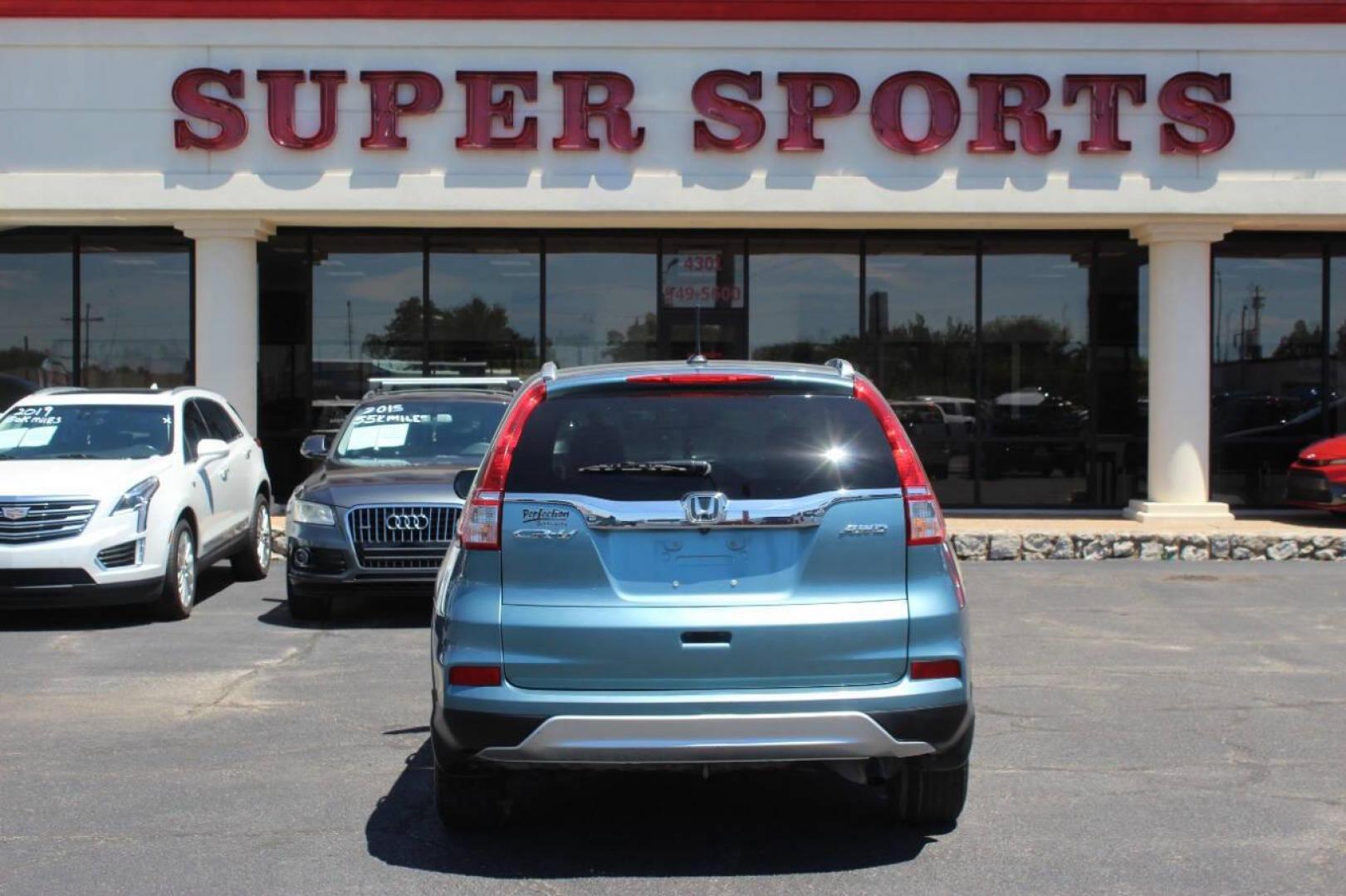 2016 Teal Honda CR-V EX-L AWD (2HKRM4H75GH) with an 2.4L L4 DOHC 16V engine, CVT transmission, located at 4301 NW 39th , Oklahoma City, OK, 73112, (405) 949-5600, 35.512135, -97.598671 - NO DRIVERS LICENCE NO-FULL COVERAGE INSURANCE-NO CREDIT CHECK. COME ON OVER TO SUPERSPORTS AND TAKE A LOOK AND TEST DRIVE. PLEASE GIVE US A CALL AT (405) 949-5600. NO LICENSIA DE MANEJAR- NO SEGURO DE COBERTURA TOTAL- NO VERIFICACCION DE CREDITO. POR FAVOR VENGAN A SUPERSPORTS, ECHE UN - Photo#5