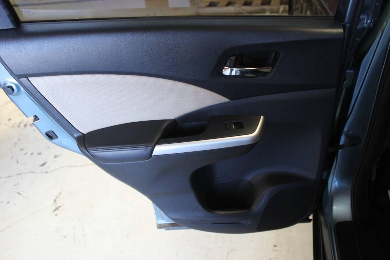 2016 Teal Honda CR-V EX-L AWD (2HKRM4H75GH) with an 2.4L L4 DOHC 16V engine, CVT transmission, located at 4301 NW 39th , Oklahoma City, OK, 73112, (405) 949-5600, 35.512135, -97.598671 - NO DRIVERS LICENCE -NO FULL COVERAGE INSURANCE - NO CREDIT CHECK. COME ON OVER TO SUPERSPORTS, TAKE A LOOK AND TEST DRIVE. PLEASE GIVE US A CALL AT (405) 949-5600. NO LICENCIA DE CONDUCIR - NO SEGURO DE COBERTURA TOTAL - NO VERIFICACION DE CREDITO. VISITENOS EN SUPERSPORTS, MIRE NUESTRO - Photo#11