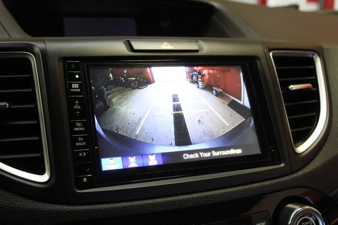 2016 Teal Honda CR-V EX-L AWD (2HKRM4H75GH) with an 2.4L L4 DOHC 16V engine, CVT transmission, located at 4301 NW 39th , Oklahoma City, OK, 73112, (405) 949-5600, 35.512135, -97.598671 - NO DRIVERS LICENCE -NO FULL COVERAGE INSURANCE - NO CREDIT CHECK. COME ON OVER TO SUPERSPORTS, TAKE A LOOK AND TEST DRIVE. PLEASE GIVE US A CALL AT (405) 949-5600. NO LICENCIA DE CONDUCIR - NO SEGURO DE COBERTURA TOTAL - NO VERIFICACION DE CREDITO. VISITENOS EN SUPERSPORTS, MIRE NUESTRO - Photo#16