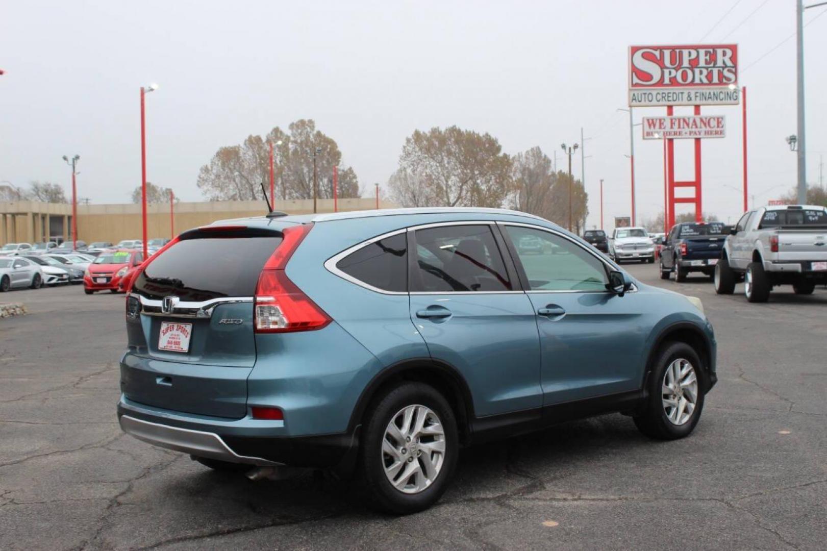 2016 Teal Honda CR-V EX-L AWD (2HKRM4H75GH) with an 2.4L L4 DOHC 16V engine, CVT transmission, located at 4301 NW 39th , Oklahoma City, OK, 73112, (405) 949-5600, 35.512135, -97.598671 - NO DRIVERS LICENCE -NO FULL COVERAGE INSURANCE - NO CREDIT CHECK. COME ON OVER TO SUPERSPORTS, TAKE A LOOK AND TEST DRIVE. PLEASE GIVE US A CALL AT (405) 949-5600. NO LICENCIA DE CONDUCIR - NO SEGURO DE COBERTURA TOTAL - NO VERIFICACION DE CREDITO. VISITENOS EN SUPERSPORTS, MIRE NUESTRO - Photo#3