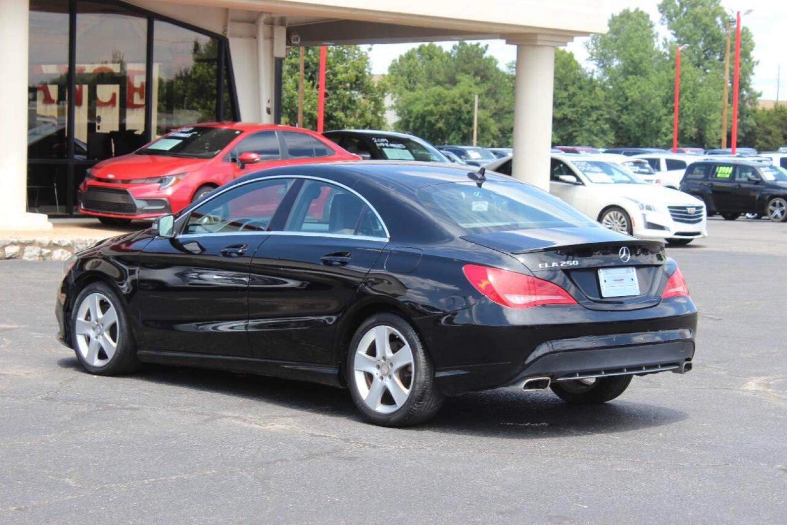 2015 Black Mercedes-Benz CLA-Class CLA250 (WDDSJ4EB6FN) with an 2.0L L4 DOHC 16V engine, 7-Speed Automatic transmission, located at 4301 NW 39th , Oklahoma City, OK, 73112, (405) 949-5600, 35.512135, -97.598671 - NO DRIVERS LICENCE NO-FULL COVERAGE INSURANCE-NO CREDIT CHECK. COME ON OVER TO SUPERSPORTS AND TAKE A LOOK AND TEST DRIVE. PLEASE GIVE US A CALL AT (405) 949-5600. NO LICENSIA DE MANEJAR- NO SEGURO DE COBERTURA TOTAL- NO VERIFICACCION DE CREDITO. POR FAVOR VENGAN A SUPERSPORTS, ECHE UN - Photo#5