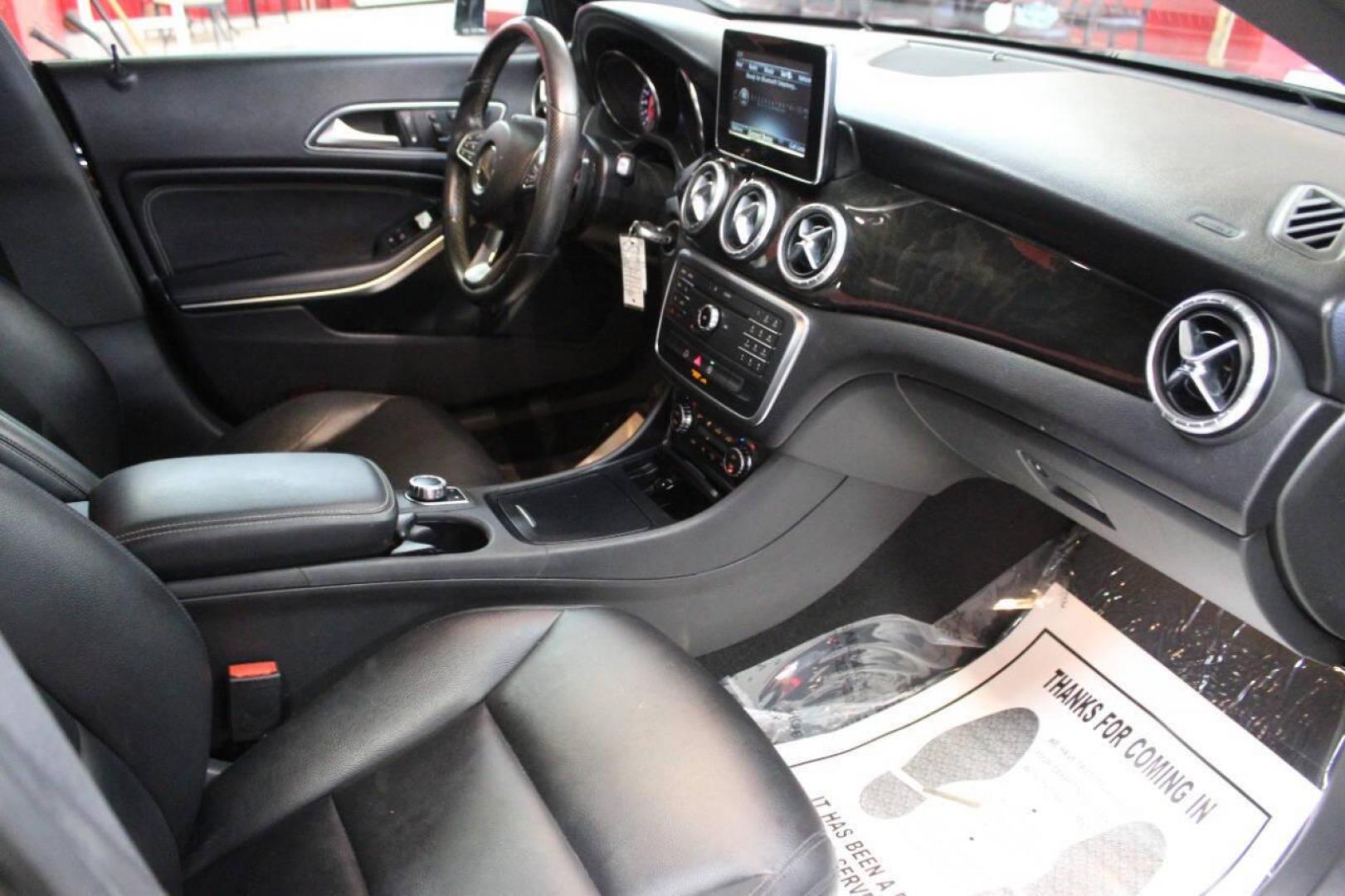 2015 Black Mercedes-Benz CLA-Class CLA250 (WDDSJ4EB6FN) with an 2.0L L4 DOHC 16V engine, 7-Speed Automatic transmission, located at 4301 NW 39th , Oklahoma City, OK, 73112, (405) 949-5600, 35.512135, -97.598671 - NO DRIVERS LICENCE NO-FULL COVERAGE INSURANCE-NO CREDIT CHECK. COME ON OVER TO SUPERSPORTS AND TAKE A LOOK AND TEST DRIVE. PLEASE GIVE US A CALL AT (405) 949-5600. NO LICENSIA DE MANEJAR- NO SEGURO DE COBERTURA TOTAL- NO VERIFICACCION DE CREDITO. POR FAVOR VENGAN A SUPERSPORTS, ECHE UN - Photo#8