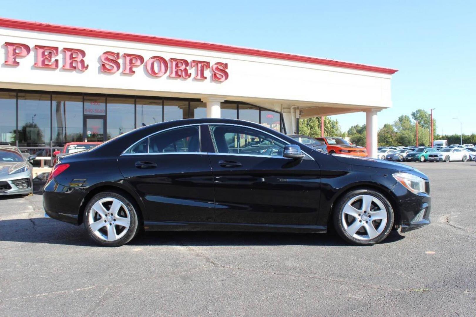2015 Black Mercedes-Benz CLA-Class CLA250 (WDDSJ4EB6FN) with an 2.0L L4 DOHC 16V engine, 7-Speed Automatic transmission, located at 4301 NW 39th , Oklahoma City, OK, 73112, (405) 949-5600, 35.512135, -97.598671 - NO DRIVERS LICENCE NO-FULL COVERAGE INSURANCE-NO CREDIT CHECK. COME ON OVER TO SUPERSPORTS AND TAKE A LOOK AND TEST DRIVE. PLEASE GIVE US A CALL AT (405) 949-5600. NO LICENSIA DE MANEJAR- NO SEGURO DE COBERTURA TOTAL- NO VERIFICACCION DE CREDITO. POR FAVOR VENGAN A SUPERSPORTS, ECHE UN - Photo#2