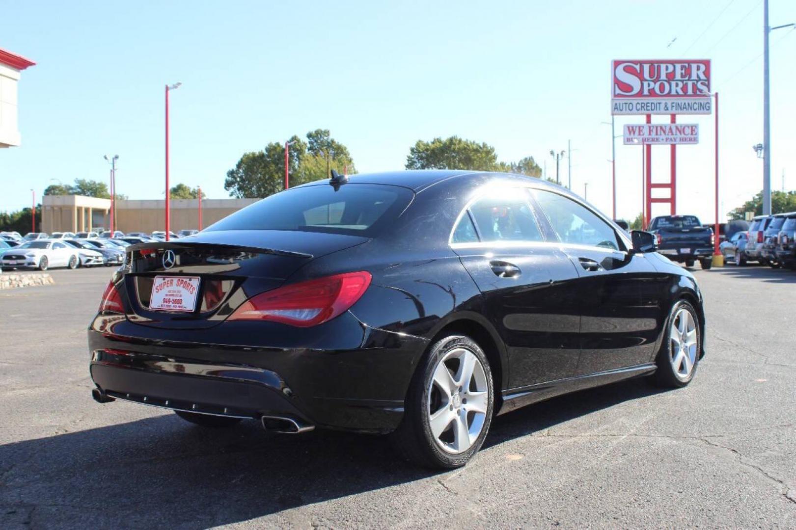2015 Black Mercedes-Benz CLA-Class CLA250 (WDDSJ4EB6FN) with an 2.0L L4 DOHC 16V engine, 7-Speed Automatic transmission, located at 4301 NW 39th , Oklahoma City, OK, 73112, (405) 949-5600, 35.512135, -97.598671 - NO DRIVERS LICENCE NO-FULL COVERAGE INSURANCE-NO CREDIT CHECK. COME ON OVER TO SUPERSPORTS AND TAKE A LOOK AND TEST DRIVE. PLEASE GIVE US A CALL AT (405) 949-5600. NO LICENSIA DE MANEJAR- NO SEGURO DE COBERTURA TOTAL- NO VERIFICACCION DE CREDITO. POR FAVOR VENGAN A SUPERSPORTS, ECHE UN - Photo#3