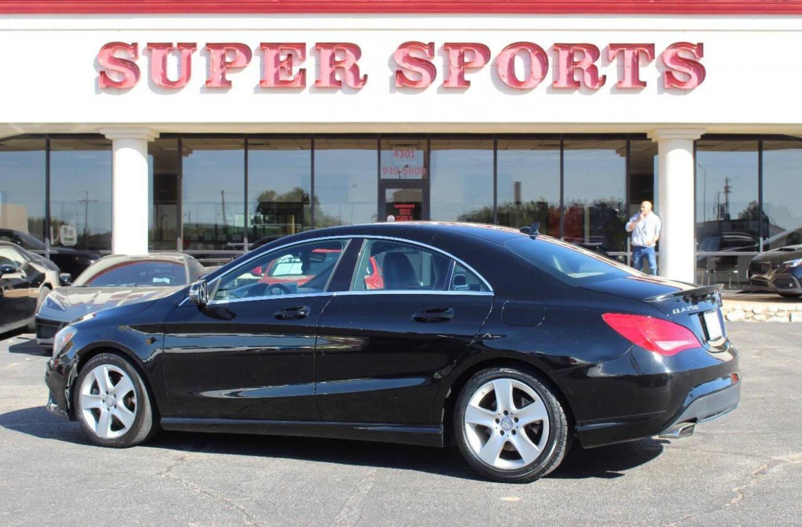 2015 Black Mercedes-Benz CLA-Class CLA250 (WDDSJ4EB6FN) with an 2.0L L4 DOHC 16V engine, 7-Speed Automatic transmission, located at 4301 NW 39th , Oklahoma City, OK, 73112, (405) 949-5600, 35.512135, -97.598671 - NO DRIVERS LICENCE NO-FULL COVERAGE INSURANCE-NO CREDIT CHECK. COME ON OVER TO SUPERSPORTS AND TAKE A LOOK AND TEST DRIVE. PLEASE GIVE US A CALL AT (405) 949-5600. NO LICENSIA DE MANEJAR- NO SEGURO DE COBERTURA TOTAL- NO VERIFICACCION DE CREDITO. POR FAVOR VENGAN A SUPERSPORTS, ECHE UN - Photo#5