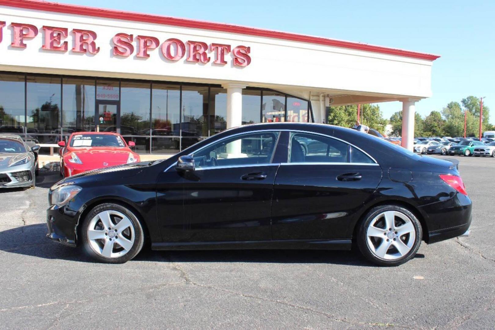 2015 Black Mercedes-Benz CLA-Class CLA250 (WDDSJ4EB6FN) with an 2.0L L4 DOHC 16V engine, 7-Speed Automatic transmission, located at 4301 NW 39th , Oklahoma City, OK, 73112, (405) 949-5600, 35.512135, -97.598671 - NO DRIVERS LICENCE NO-FULL COVERAGE INSURANCE-NO CREDIT CHECK. COME ON OVER TO SUPERSPORTS AND TAKE A LOOK AND TEST DRIVE. PLEASE GIVE US A CALL AT (405) 949-5600. NO LICENSIA DE MANEJAR- NO SEGURO DE COBERTURA TOTAL- NO VERIFICACCION DE CREDITO. POR FAVOR VENGAN A SUPERSPORTS, ECHE UN - Photo#6