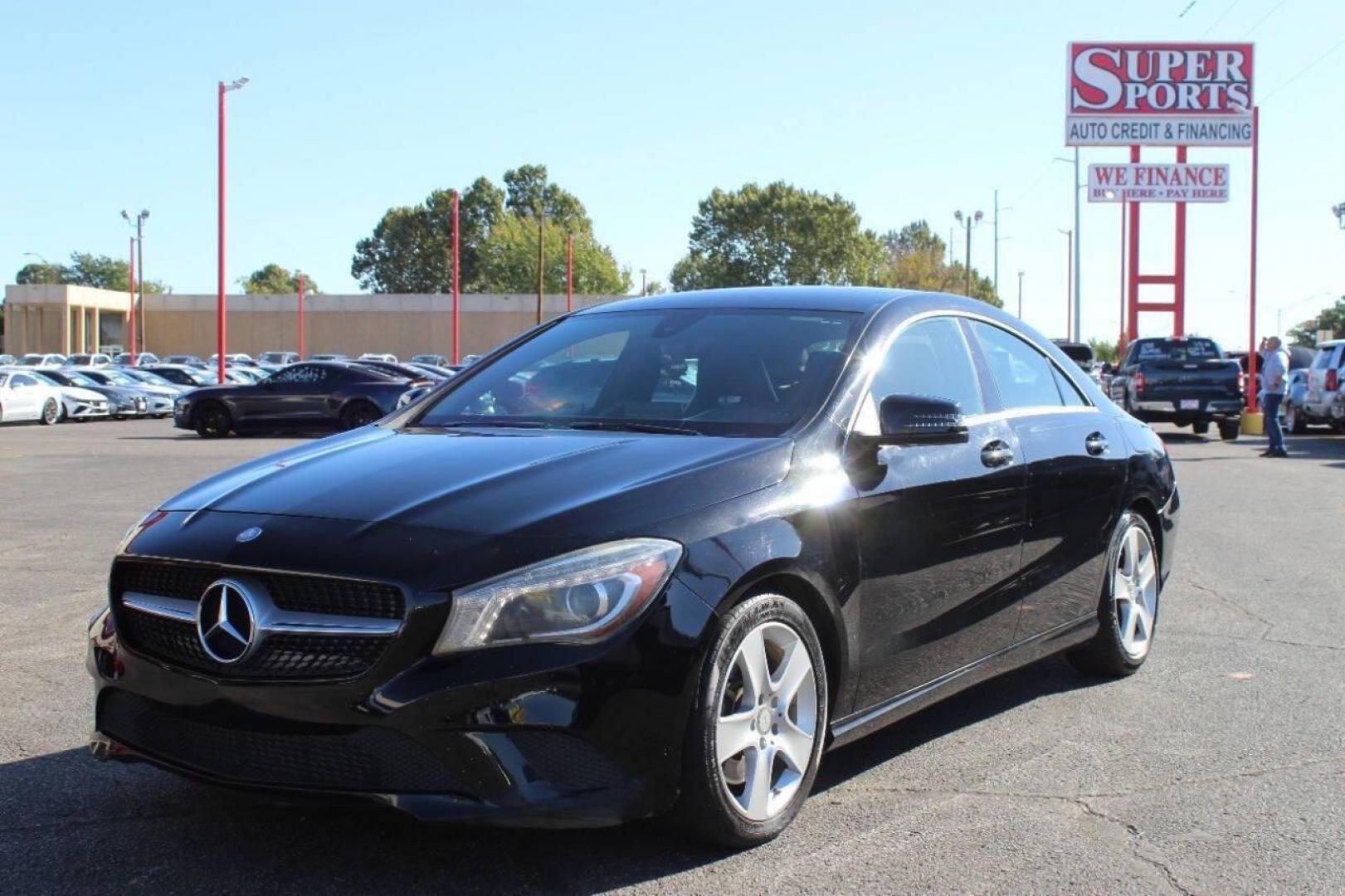 2015 Black Mercedes-Benz CLA-Class CLA250 (WDDSJ4EB6FN) with an 2.0L L4 DOHC 16V engine, 7-Speed Automatic transmission, located at 4301 NW 39th , Oklahoma City, OK, 73112, (405) 949-5600, 35.512135, -97.598671 - NO DRIVERS LICENCE NO-FULL COVERAGE INSURANCE-NO CREDIT CHECK. COME ON OVER TO SUPERSPORTS AND TAKE A LOOK AND TEST DRIVE. PLEASE GIVE US A CALL AT (405) 949-5600. NO LICENSIA DE MANEJAR- NO SEGURO DE COBERTURA TOTAL- NO VERIFICACCION DE CREDITO. POR FAVOR VENGAN A SUPERSPORTS, ECHE UN - Photo#4