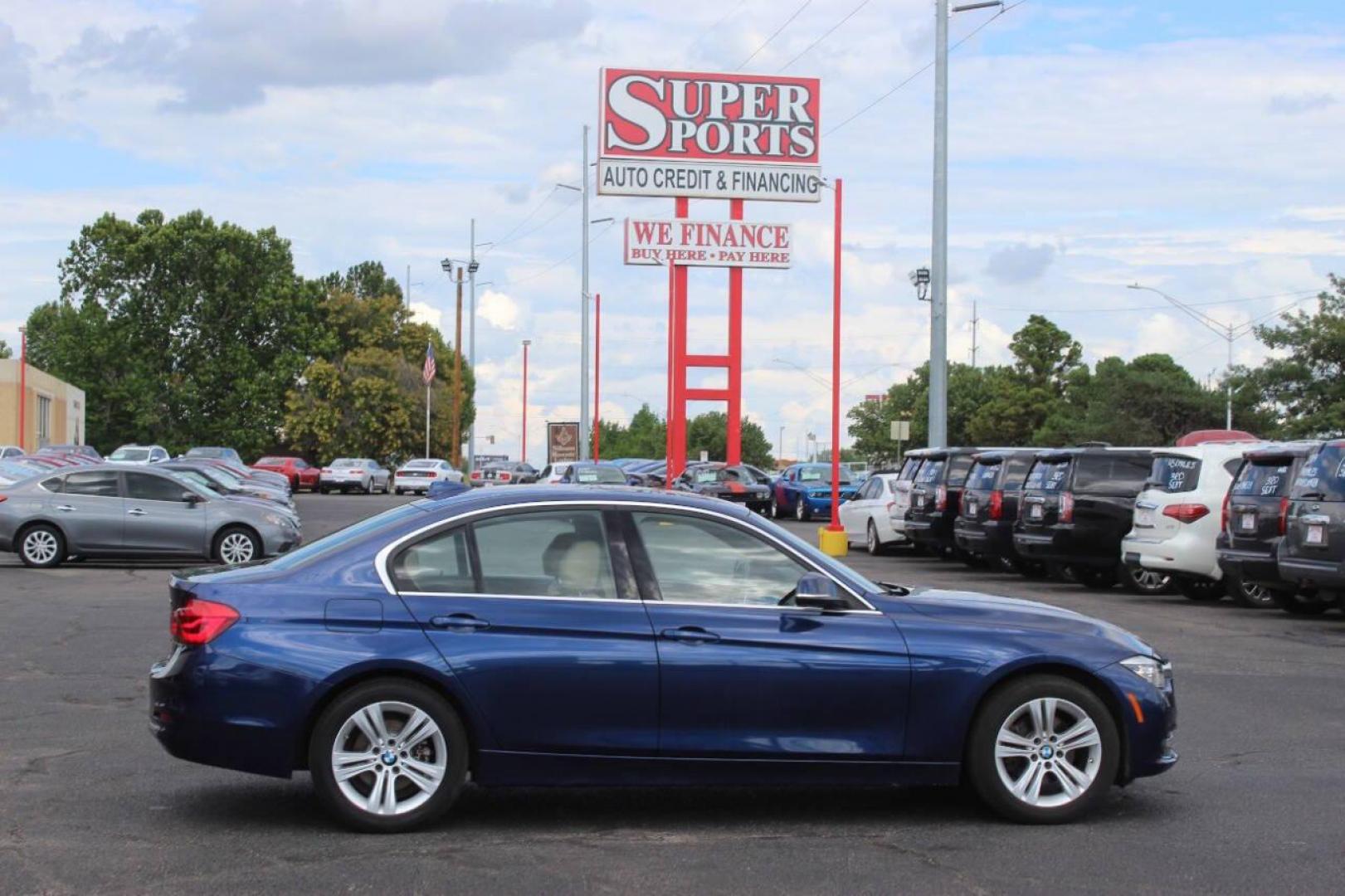 2018 Blue BMW 3-Series 330i xDrive SULEV Sedan (WBA8D9G51JN) with an 3.0L L6 DOHC 24V engine, 8A transmission, located at 4301 NW 39th , Oklahoma City, OK, 73112, (405) 949-5600, 35.512135, -97.598671 - NO DRIVERS LICENCE NO-FULL COVERAGE INSURANCE-NO CREDIT CHECK. COME ON OVER TO SUPERSPORTS AND TAKE A LOOK AND TEST DRIVE. PLEASE GIVE US A CALL AT (405) 949-5600. NO LICENSIA DE MANEJAR- NO SEGURO DE COBERTURA TOTAL- NO VERIFICACCION DE CREDITO. POR FAVOR VENGAN A SUPERSPORTS, ECHE UN - Photo#4