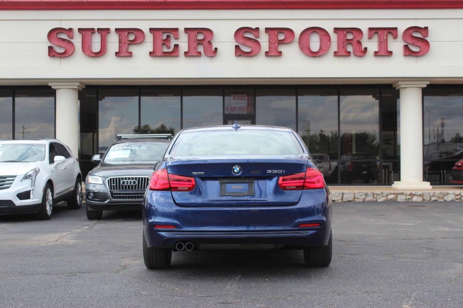 2018 Blue BMW 3-Series 330i xDrive SULEV Sedan (WBA8D9G51JN) with an 3.0L L6 DOHC 24V engine, 8A transmission, located at 4301 NW 39th , Oklahoma City, OK, 73112, (405) 949-5600, 35.512135, -97.598671 - NO DRIVERS LICENCE NO-FULL COVERAGE INSURANCE-NO CREDIT CHECK. COME ON OVER TO SUPERSPORTS AND TAKE A LOOK AND TEST DRIVE. PLEASE GIVE US A CALL AT (405) 949-5600. NO LICENSIA DE MANEJAR- NO SEGURO DE COBERTURA TOTAL- NO VERIFICACCION DE CREDITO. POR FAVOR VENGAN A SUPERSPORTS, ECHE UN - Photo#5