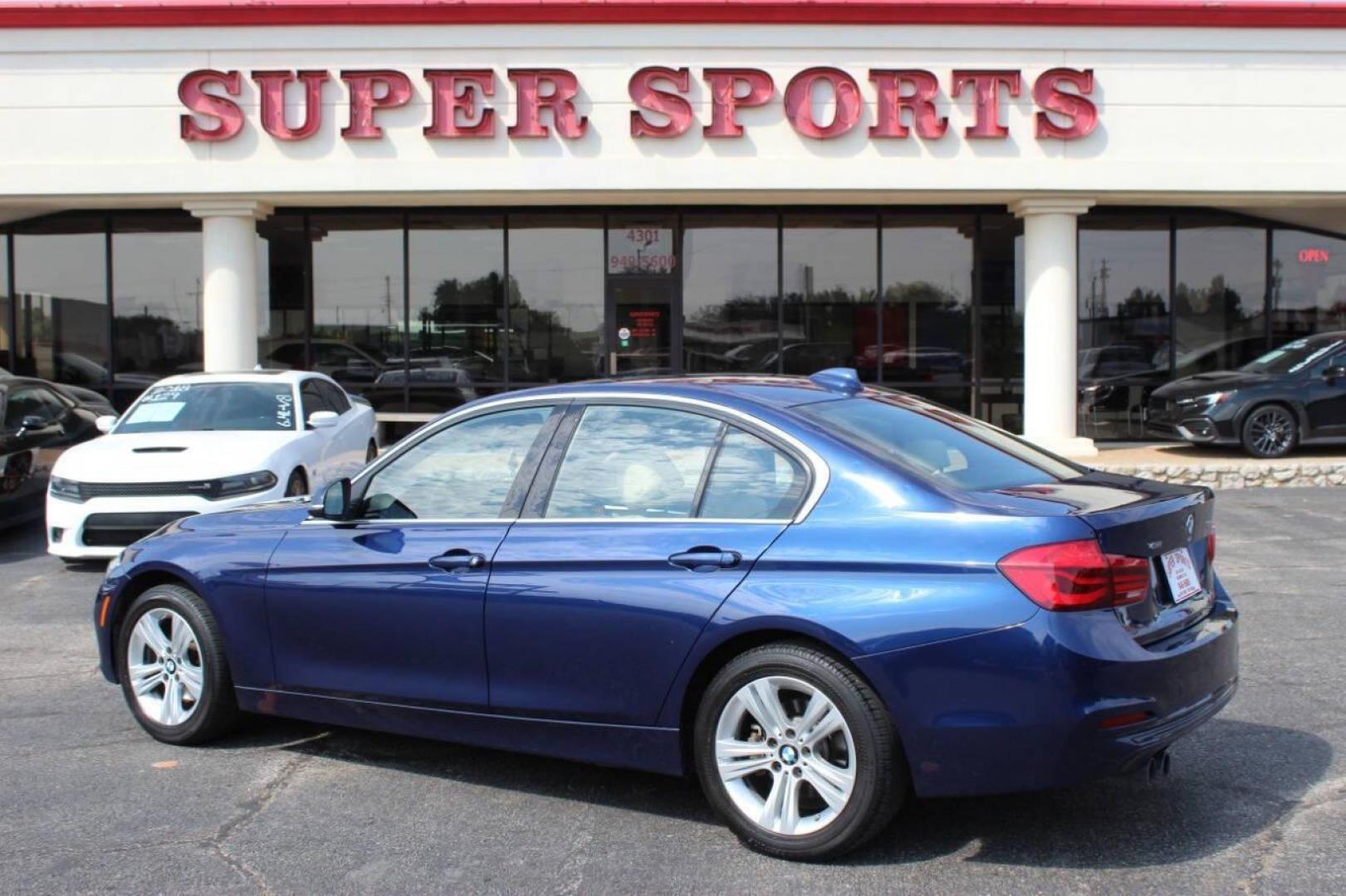 2018 Blue BMW 3-Series 330i xDrive SULEV Sedan (WBA8D9G51JN) with an 3.0L L6 DOHC 24V engine, 8A transmission, located at 4301 NW 39th , Oklahoma City, OK, 73112, (405) 949-5600, 35.512135, -97.598671 - NO DRIVERS LICENCE -NO FULL COVERAGE INSURANCE - NO CREDIT CHECK. COME ON OVER TO SUPERSPORTS, TAKE A LOOK AND TEST DRIVE. PLEASE GIVE US A CALL AT (405) 949-5600. NO LICENCIA DE CONDUCIR - NO SEGURO DE COBERTURA TOTAL - NO VERIFICACION DE CREDITO. VISITENOS EN SUPERSPORTS, MIRE NUESTRO - Photo#5