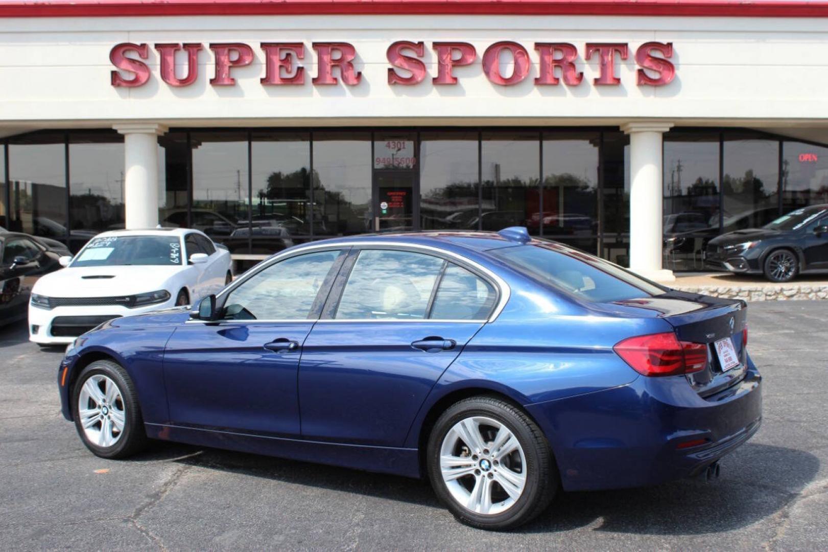 2018 Blue BMW 3 Series 330i xDrive SULEV Sedan (WBA8D9G51JN) with an 2.0L I4 Turbocharger 2.0L I4 engine, Automatic 8-Speed transmission, located at 4301 NW 39th , Oklahoma City, OK, 73112, (405) 949-5600, 35.512135, -97.598671 - NO DRIVERS LICENCE -NO FULL COVERAGE INSURANCE - NO CREDIT CHECK. COME ON OVER TO SUPERSPORTS, TAKE A LOOK AND TEST DRIVE. PLEASE GIVE US A CALL AT (405) 949-5600. NO LICENCIA DE CONDUCIR - NO SEGURO DE COBERTURA TOTAL - NO VERIFICACION DE CREDITO. VISITENOS EN SUPERSPORTS, MIRE NUESTRO- Photo#4