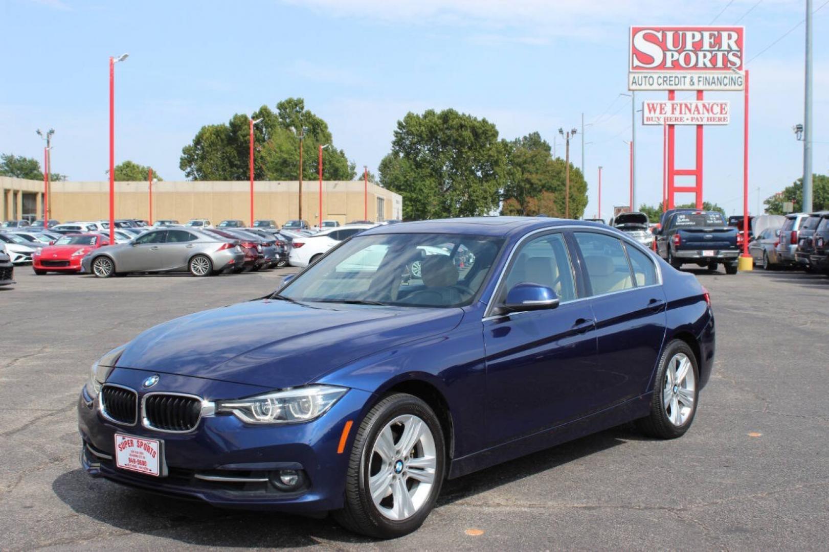 2018 Blue BMW 3 Series 330i xDrive SULEV Sedan (WBA8D9G51JN) with an 2.0L I4 Turbocharger 2.0L I4 engine, Automatic 8-Speed transmission, located at 4301 NW 39th , Oklahoma City, OK, 73112, (405) 949-5600, 35.512135, -97.598671 - NO DRIVERS LICENCE -NO FULL COVERAGE INSURANCE - NO CREDIT CHECK. COME ON OVER TO SUPERSPORTS, TAKE A LOOK AND TEST DRIVE. PLEASE GIVE US A CALL AT (405) 949-5600. NO LICENCIA DE CONDUCIR - NO SEGURO DE COBERTURA TOTAL - NO VERIFICACION DE CREDITO. VISITENOS EN SUPERSPORTS, MIRE NUESTRO- Photo#6