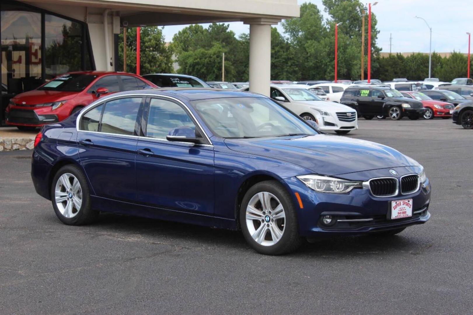 2018 Blue BMW 3-Series 330i xDrive SULEV Sedan (WBA8D9G51JN) with an 3.0L L6 DOHC 24V engine, 8A transmission, located at 4301 NW 39th , Oklahoma City, OK, 73112, (405) 949-5600, 35.512135, -97.598671 - NO DRIVERS LICENCE NO-FULL COVERAGE INSURANCE-NO CREDIT CHECK. COME ON OVER TO SUPERSPORTS AND TAKE A LOOK AND TEST DRIVE. PLEASE GIVE US A CALL AT (405) 949-5600. NO LICENSIA DE MANEJAR- NO SEGURO DE COBERTURA TOTAL- NO VERIFICACCION DE CREDITO. POR FAVOR VENGAN A SUPERSPORTS, ECHE UN - Photo#2