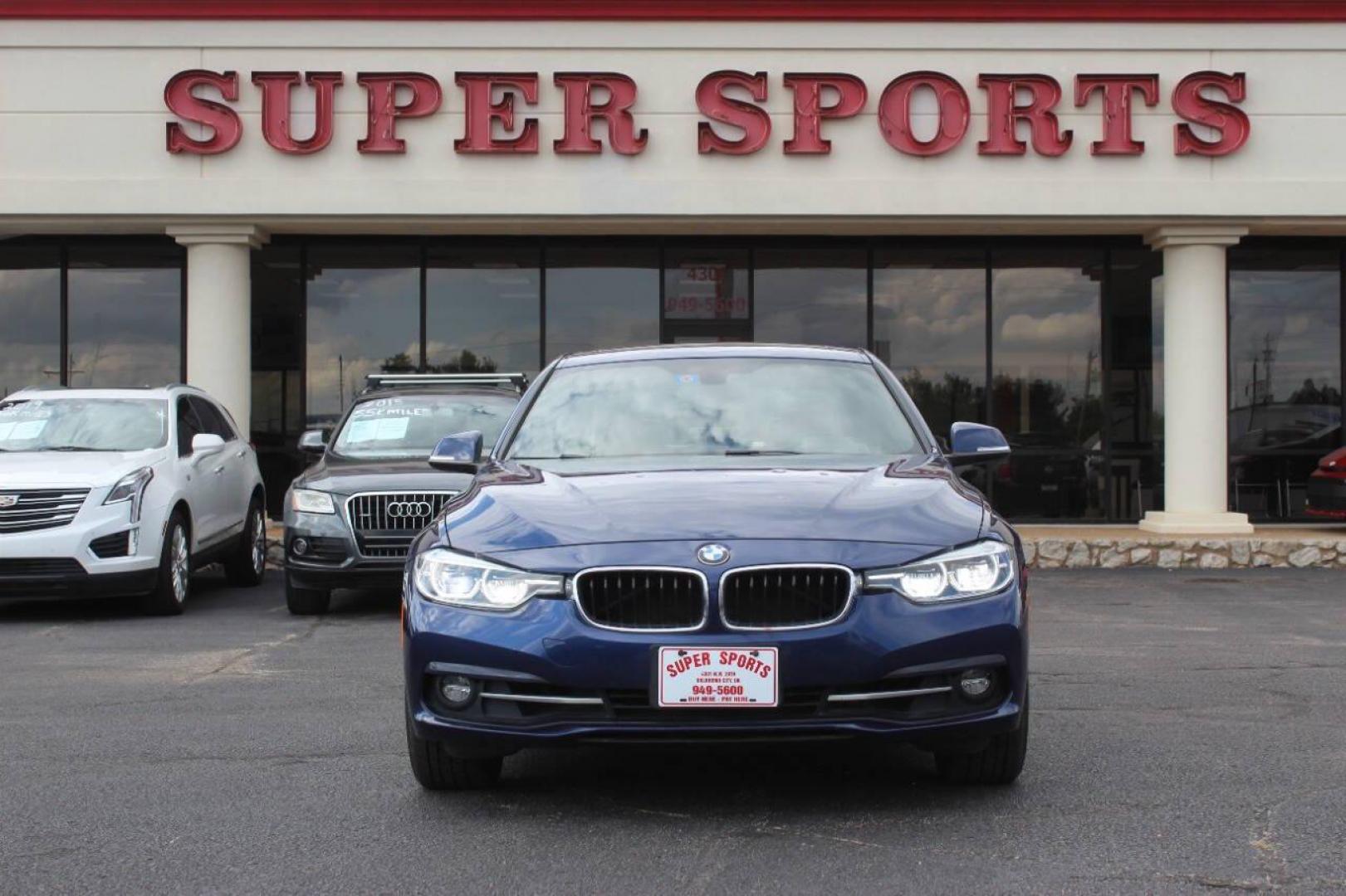 2018 Blue BMW 3-Series 330i xDrive SULEV Sedan (WBA8D9G51JN) with an 3.0L L6 DOHC 24V engine, 8A transmission, located at 4301 NW 39th , Oklahoma City, OK, 73112, (405) 949-5600, 35.512135, -97.598671 - NO DRIVERS LICENCE NO-FULL COVERAGE INSURANCE-NO CREDIT CHECK. COME ON OVER TO SUPERSPORTS AND TAKE A LOOK AND TEST DRIVE. PLEASE GIVE US A CALL AT (405) 949-5600. NO LICENSIA DE MANEJAR- NO SEGURO DE COBERTURA TOTAL- NO VERIFICACCION DE CREDITO. POR FAVOR VENGAN A SUPERSPORTS, ECHE UN - Photo#3