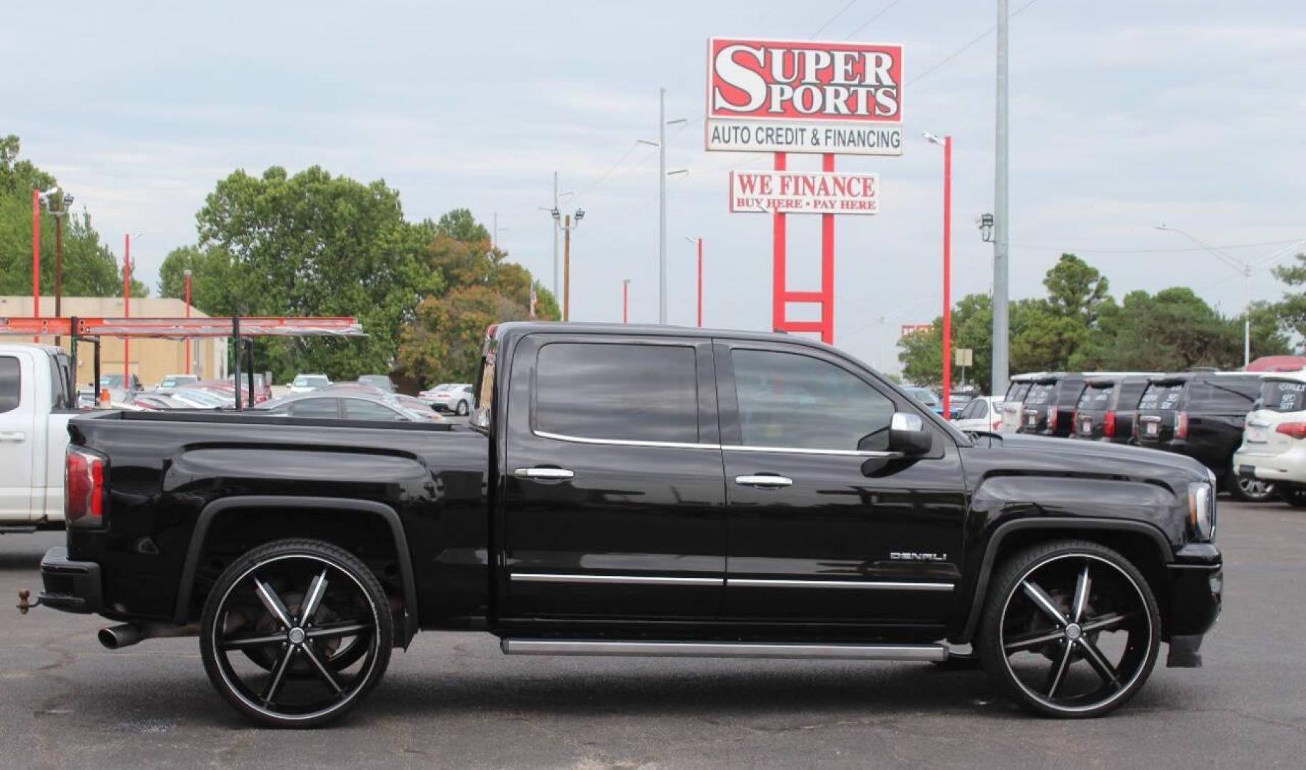 2018 Black GMC Sierra 1500 Denali Crew Cab Long Box 4WD (3GTU2PEJ9JG) with an 6.2L V8 OHV 16V engine, 6A transmission, located at 4301 NW 39th , Oklahoma City, OK, 73112, (405) 949-5600, 35.512135, -97.598671 - NO DRIVERS LICENCE NO-FULL COVERAGE INSURANCE-NO CREDIT CHECK. COME ON OVER TO SUPERSPORTS AND TAKE A LOOK AND TEST DRIVE. PLEASE GIVE US A CALL AT (405) 949-5600. NO LICENSIA DE MANEJAR- NO SEGURO DE COBERTURA TOTAL- NO VERIFICACCION DE CREDITO. POR FAVOR VENGAN A SUPERSPORTS, ECHE UN - Photo#4