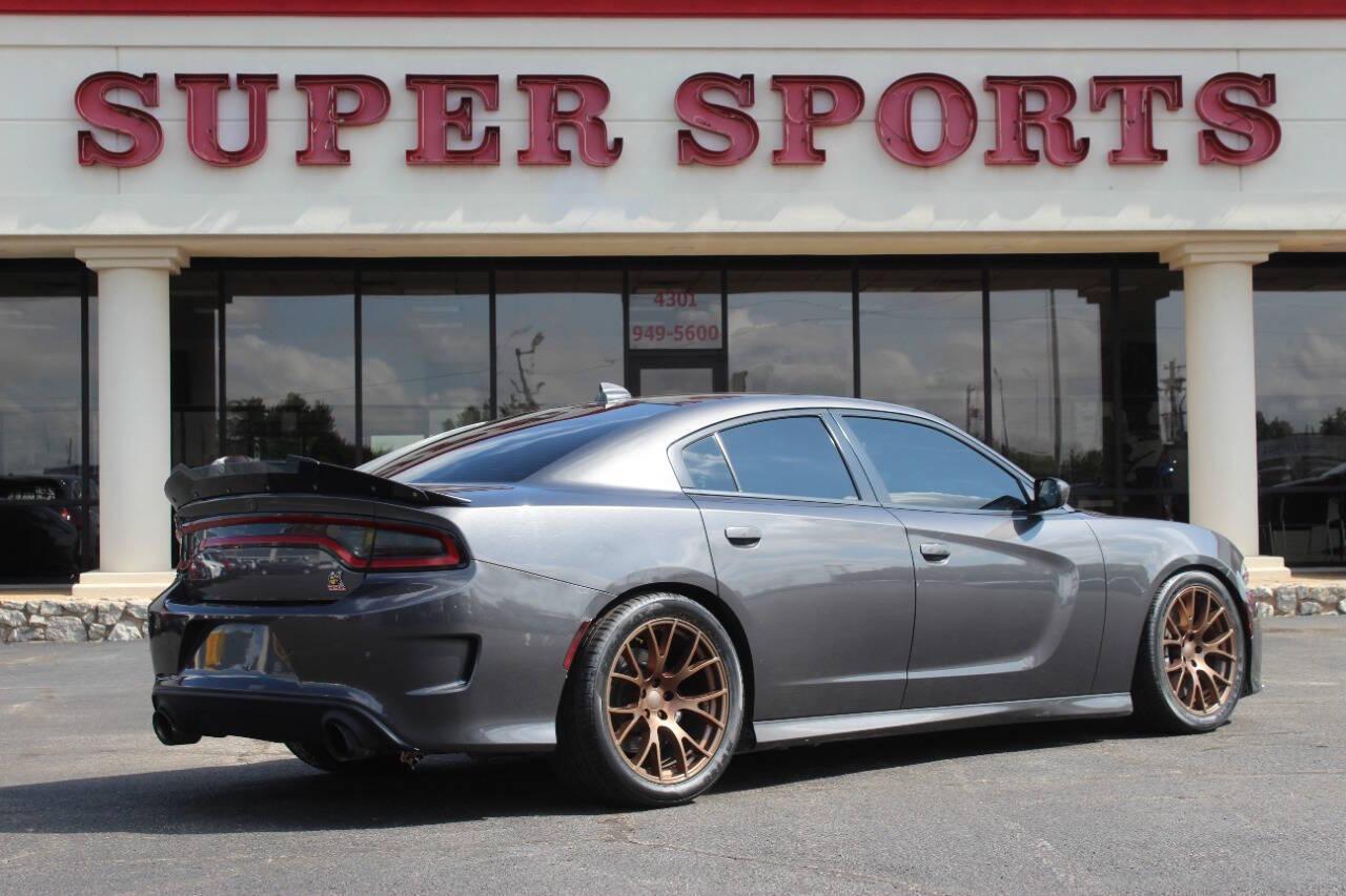 2018 Charcoal Dodge Charger SRT 392 (2C3CDXGJ9JH) with an 6.4L V8 6.4L V8 engine, Automatic 8-Speed transmission, located at 4301 NW 39th , Oklahoma City, OK, 73112, (405) 949-5600, 35.512135, -97.598671 - NO DRIVERS LICENCE NO-FULL COVERAGE INSURANCE-NO CREDIT CHECK. COME ON OVER TO SUPERSPORTS AND TAKE A LOOK AND TEST DRIVE. PLEASE GIVE US A CALL AT (405) 949-5600. NO LICENSIA DE MANEJAR- NO SEGURO DE COBERTURA TOTAL- NO VERIFICACCION DE CREDITO. POR FAVOR VENGAN A SUPERSPORTS, ECHE UN - Photo#4