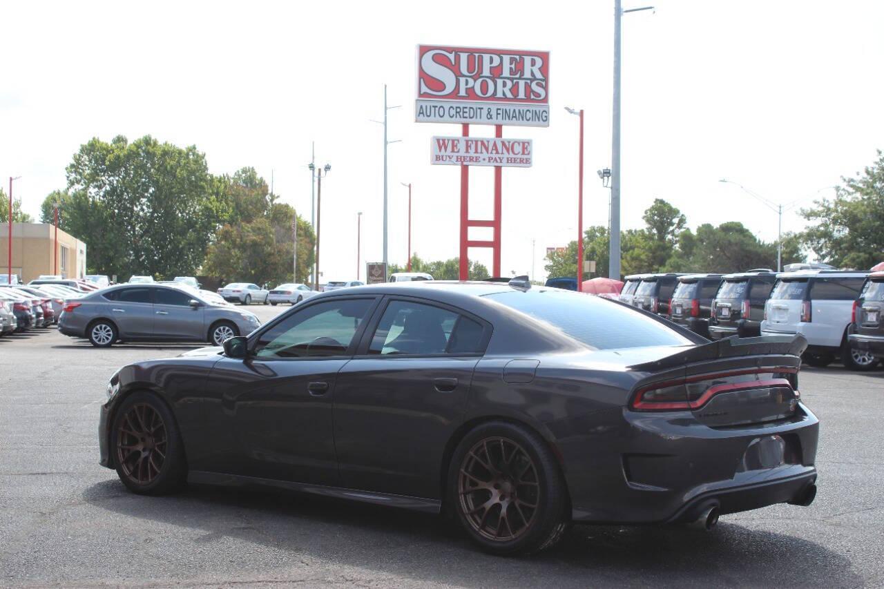 2018 Charcoal Dodge Charger SRT 392 (2C3CDXGJ9JH) with an 6.4L V8 6.4L V8 engine, Automatic 8-Speed transmission, located at 4301 NW 39th , Oklahoma City, OK, 73112, (405) 949-5600, 35.512135, -97.598671 - NO DRIVERS LICENCE NO-FULL COVERAGE INSURANCE-NO CREDIT CHECK. COME ON OVER TO SUPERSPORTS AND TAKE A LOOK AND TEST DRIVE. PLEASE GIVE US A CALL AT (405) 949-5600. NO LICENSIA DE MANEJAR- NO SEGURO DE COBERTURA TOTAL- NO VERIFICACCION DE CREDITO. POR FAVOR VENGAN A SUPERSPORTS, ECHE UN - Photo#6