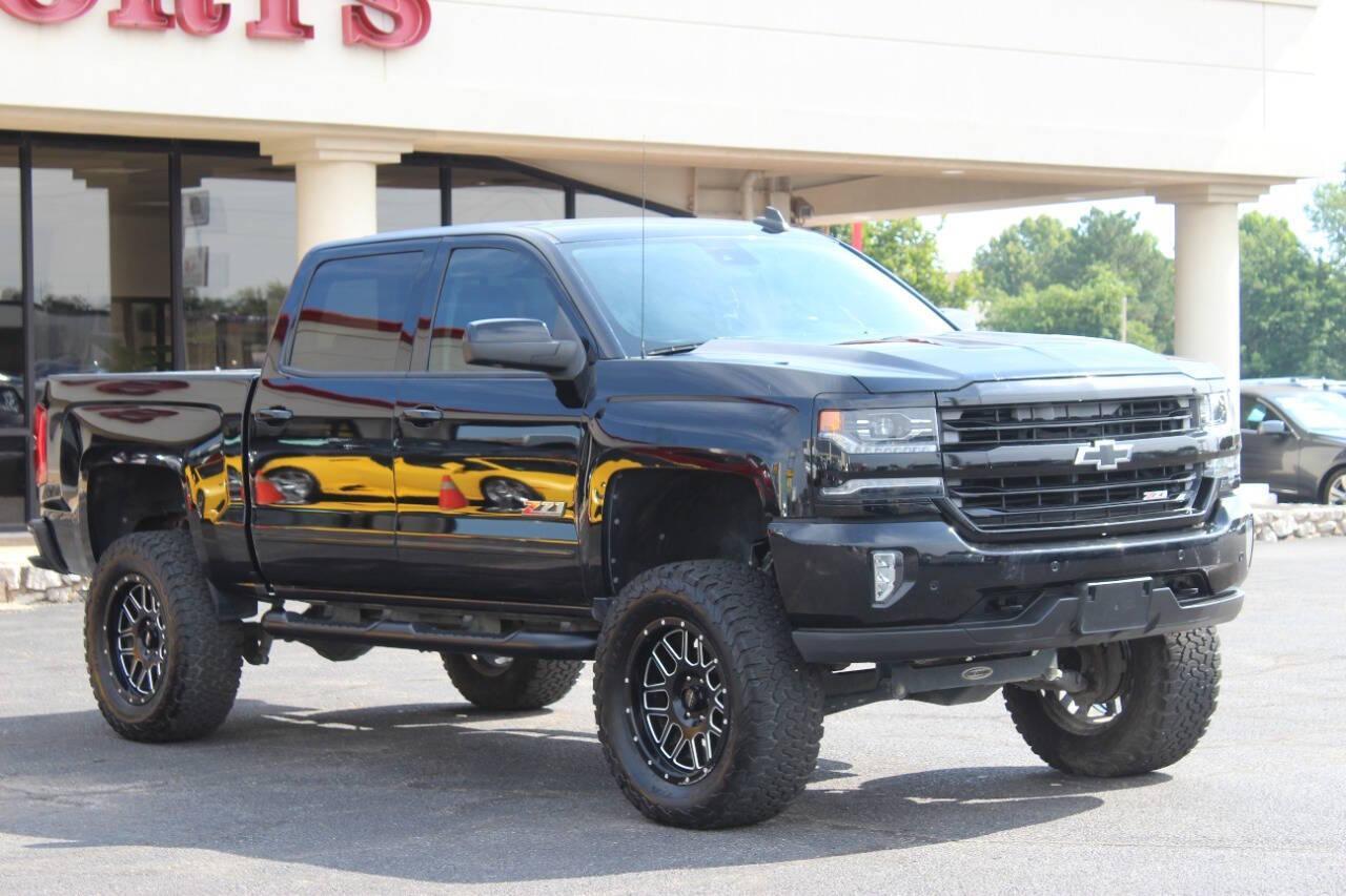 2017 Black Chevrolet Silverado 1500 LTZ Crew Cab Long Box 4WD (3GCUKSEC7HG) with an 5.3L V8 5.3L V8 engine, Automatic 8-Speed transmission, located at 4301 NW 39th , Oklahoma City, OK, 73112, (405) 949-5600, 35.512135, -97.598671 - NO DRIVERS LICENCE NO-FULL COVERAGE INSURANCE-NO CREDIT CHECK. COME ON OVER TO SUPERSPORTS AND TAKE A LOOK AND TEST DRIVE PLEASE GIVE US A CALL AT (405) 949-5600. NO LICENSIA DE MANEJAR- NO SEGURO DE COBERTURA TOTAL- NO VERIFICACCION DE CREDITO. POR FAVOR VENGAN A SUPERSPORTS, ECHE UN V - Photo#0