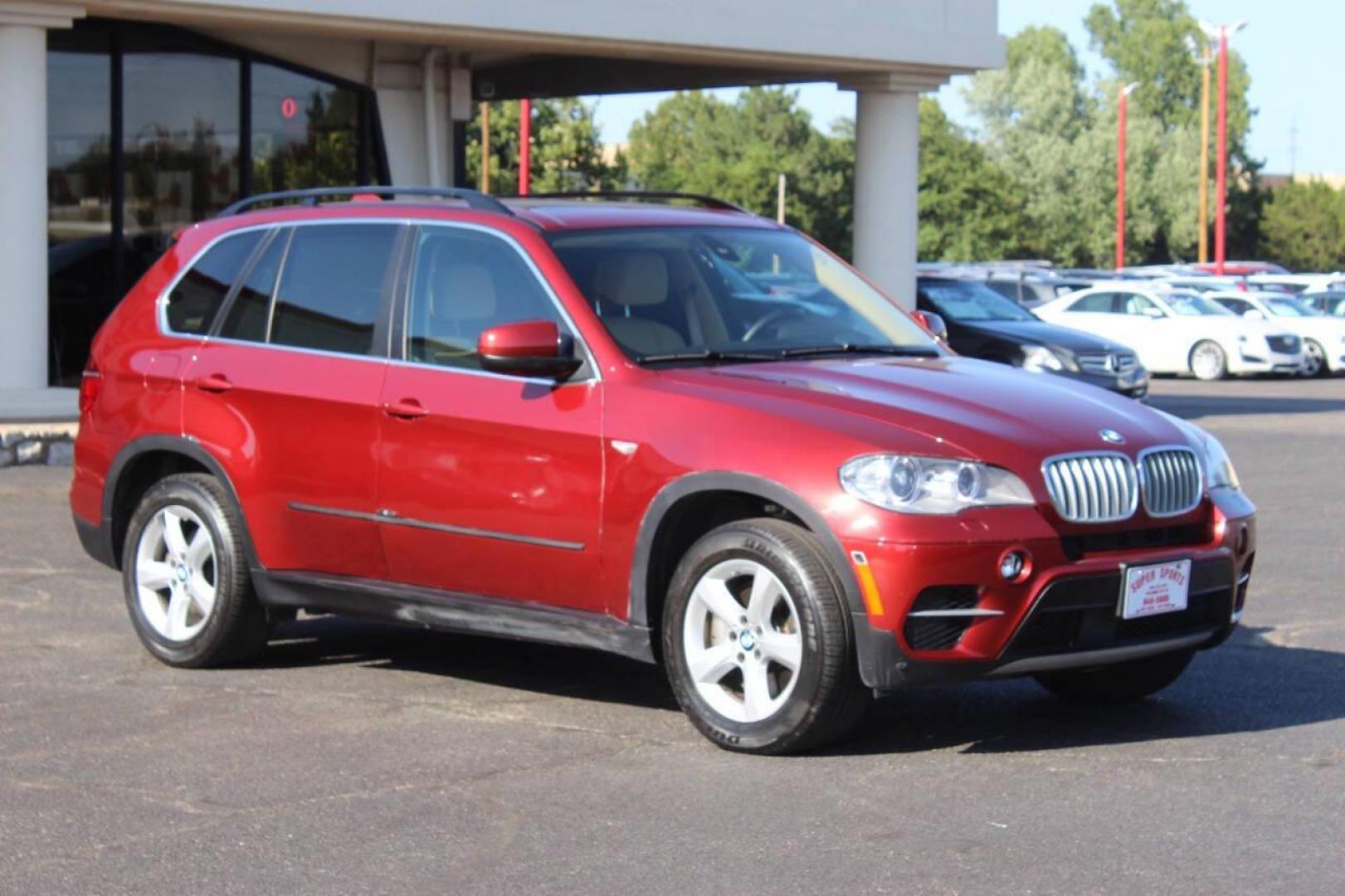 2013 Burgundy BMW X5 xDrive50i (5UXZV8C53DL) with an 4.8L V8 DOHC 32V engine, 6-Speed Automatic transmission, located at 4301 NW 39th , Oklahoma City, OK, 73112, (405) 949-5600, 35.512135, -97.598671 - NO DRIVERS LICENCE NO-FULL COVERAGE INSURANCE-NO CREDIT CHECK. COME ON OVER TO SUPERSPORTS AND TAKE A LOOK AND TEST DRIVE. PLEASE GIVE US A CALL AT (405) 949-5600. NO LICENSIA DE MANEJAR- NO SEGURO DE COBERTURA TOTAL- NO VERIFICACCION DE CREDITO. POR FAVOR VENGAN A SUPERSPORTS, ECHE UN - Photo#0