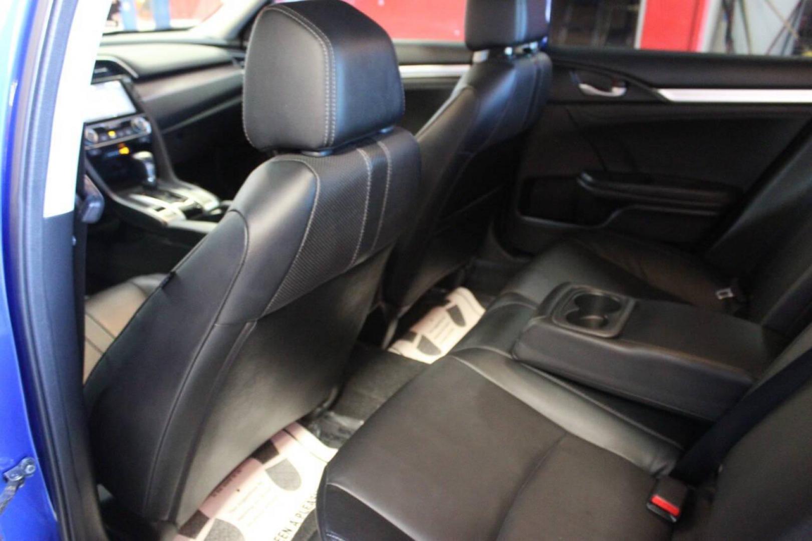 2017 Blue Honda Civic Touring Sedan CVT (19XFC1F93HE) with an 1.5L L4 DOHC 16V TURBO engine, CVT transmission, located at 4301 NW 39th , Oklahoma City, OK, 73112, (405) 949-5600, 35.512135, -97.598671 - NO DRIVERS LICENCE NO-FULL COVERAGE INSURANCE-NO CREDIT CHECK. COME ON OVER TO SUPERSPORTS AND TAKE A LOOK AND TEST DRIVE. PLEASE GIVE US A CALL AT (405) 949-5600. NO LICENSIA DE MANEJAR- NO SEGURO DE COBERTURA TOTAL- NO VERIFICACCION DE CREDITO. POR FAVOR VENGAN A SUPERSPORTS, ECHE UN - Photo#13