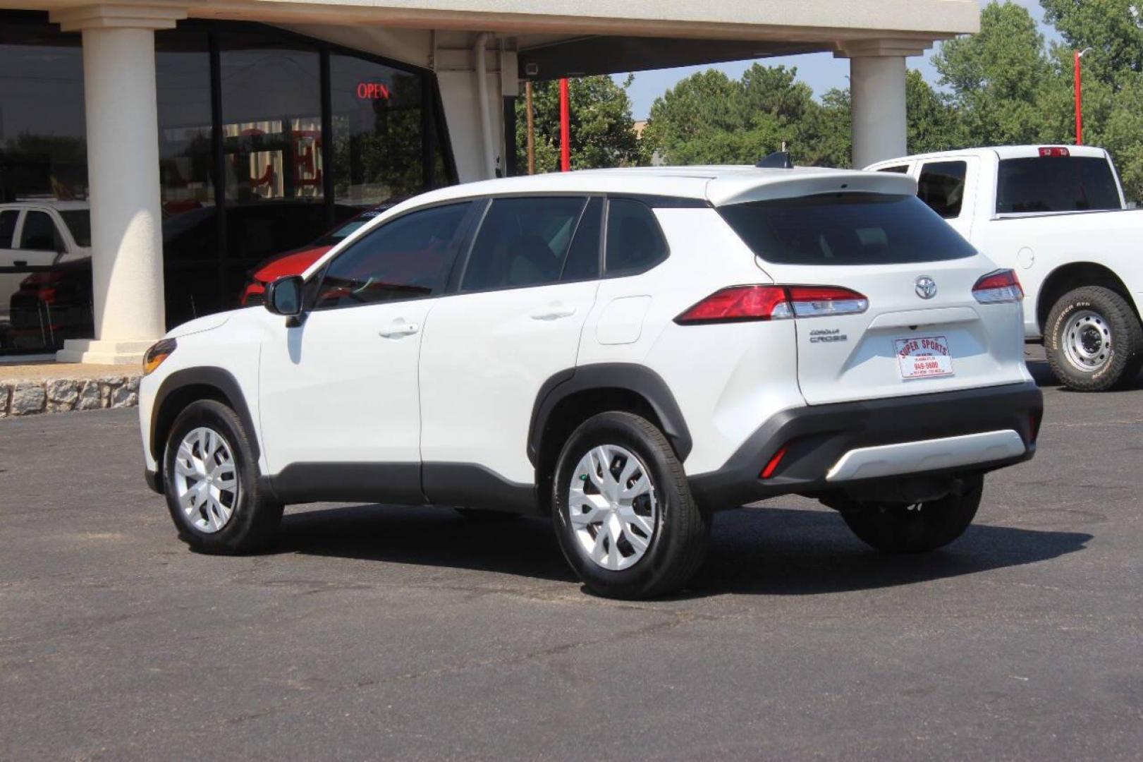 2023 White Toyota Corolla Cross L AWD (7MUAAAAG1PV) with an 2.0L L4 DOHC 16V engine, CVT transmission, located at 4301 NW 39th , Oklahoma City, OK, 73112, (405) 949-5600, 35.512135, -97.598671 - NO DRIVERS LICENCE NO-FULL COVERAGE INSURANCE-NO CREDIT CHECK. COME ON OVER TO SUPERSPORTS AND TAKE A LOOK AND TEST DRIVE. PLEASE GIVE US A CALL AT (405) 949-5600. NO LICENSIA DE MANEJAR- NO SEGURO DE COBERTURA TOTAL- NO VERIFICACCION DE CREDITO. POR FAVOR VENGAN A SUPERSPORTS, ECHE UN - Photo#6