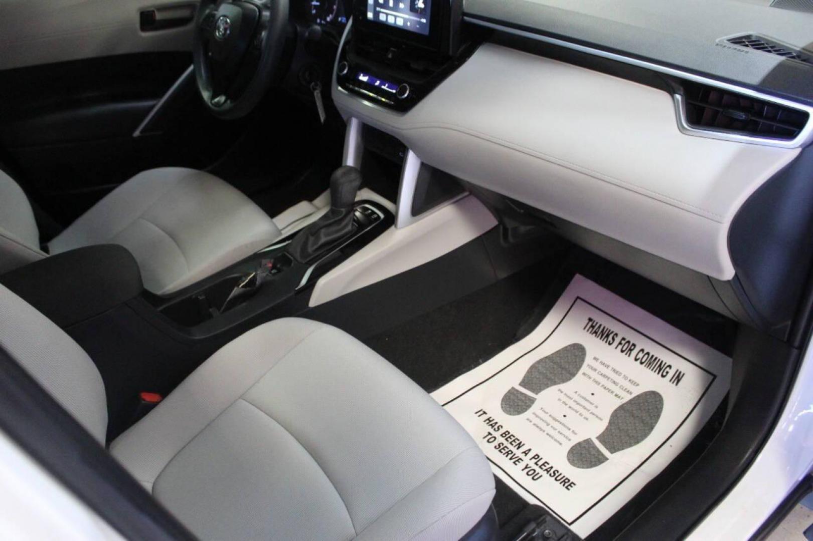 2023 White Toyota Corolla Cross L AWD (7MUAAAAG1PV) with an 2.0L L4 DOHC 16V engine, CVT transmission, located at 4301 NW 39th , Oklahoma City, OK, 73112, (405) 949-5600, 35.512135, -97.598671 - NO DRIVERS LICENCE NO-FULL COVERAGE INSURANCE-NO CREDIT CHECK. COME ON OVER TO SUPERSPORTS AND TAKE A LOOK AND TEST DRIVE. PLEASE GIVE US A CALL AT (405) 949-5600. NO LICENSIA DE MANEJAR- NO SEGURO DE COBERTURA TOTAL- NO VERIFICACCION DE CREDITO. POR FAVOR VENGAN A SUPERSPORTS, ECHE UN - Photo#8