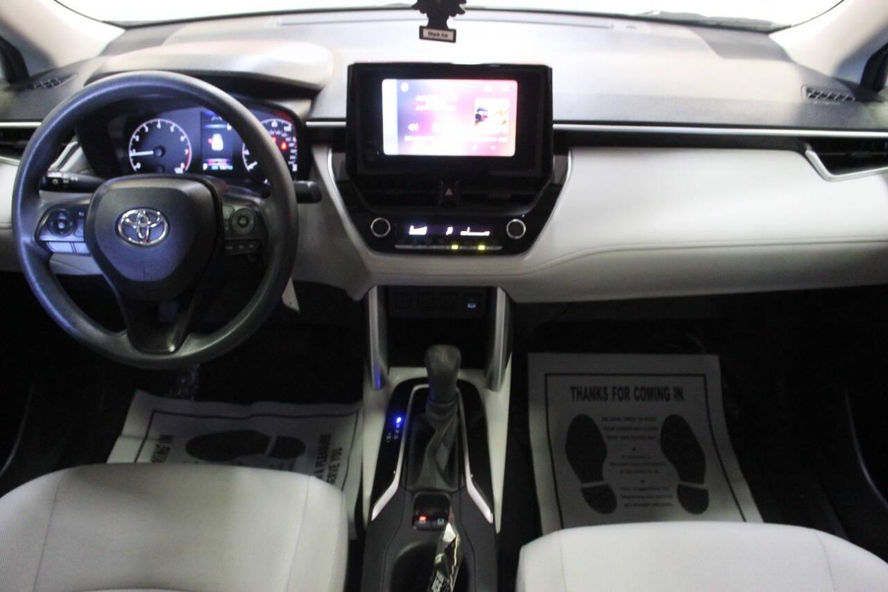 2023 White Toyota Corolla Cross L AWD (7MUAAAAG1PV) with an 2.0L L4 DOHC 16V engine, CVT transmission, located at 4301 NW 39th , Oklahoma City, OK, 73112, (405) 949-5600, 35.512135, -97.598671 - NO DRIVERS LICENCE -NO FULL COVERAGE INSURANCE - NO CREDIT CHECK. COME ON OVER TO SUPERSPORTS, TAKE A LOOK AND TEST DRIVE. PLEASE GIVE US A CALL AT (405) 949-5600. NO LICENCIA DE CONDUCIR - NO SEGURO DE COBERTURA TOTAL - NO VERIFICACION DE CREDITO. VISITENOS EN SUPERSPORTS, MIRE NUESTRO - Photo#17