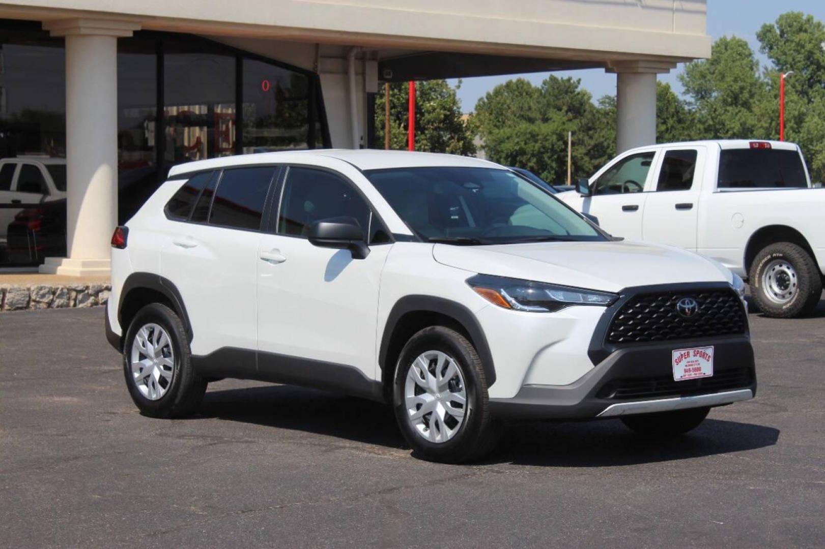 2023 White Toyota Corolla Cross L AWD (7MUAAAAG1PV) with an 2.0L L4 DOHC 16V engine, CVT transmission, located at 4301 NW 39th , Oklahoma City, OK, 73112, (405) 949-5600, 35.512135, -97.598671 - NO DRIVERS LICENCE NO-FULL COVERAGE INSURANCE-NO CREDIT CHECK. COME ON OVER TO SUPERSPORTS AND TAKE A LOOK AND TEST DRIVE. PLEASE GIVE US A CALL AT (405) 949-5600. NO LICENSIA DE MANEJAR- NO SEGURO DE COBERTURA TOTAL- NO VERIFICACCION DE CREDITO. POR FAVOR VENGAN A SUPERSPORTS, ECHE UN - Photo#2